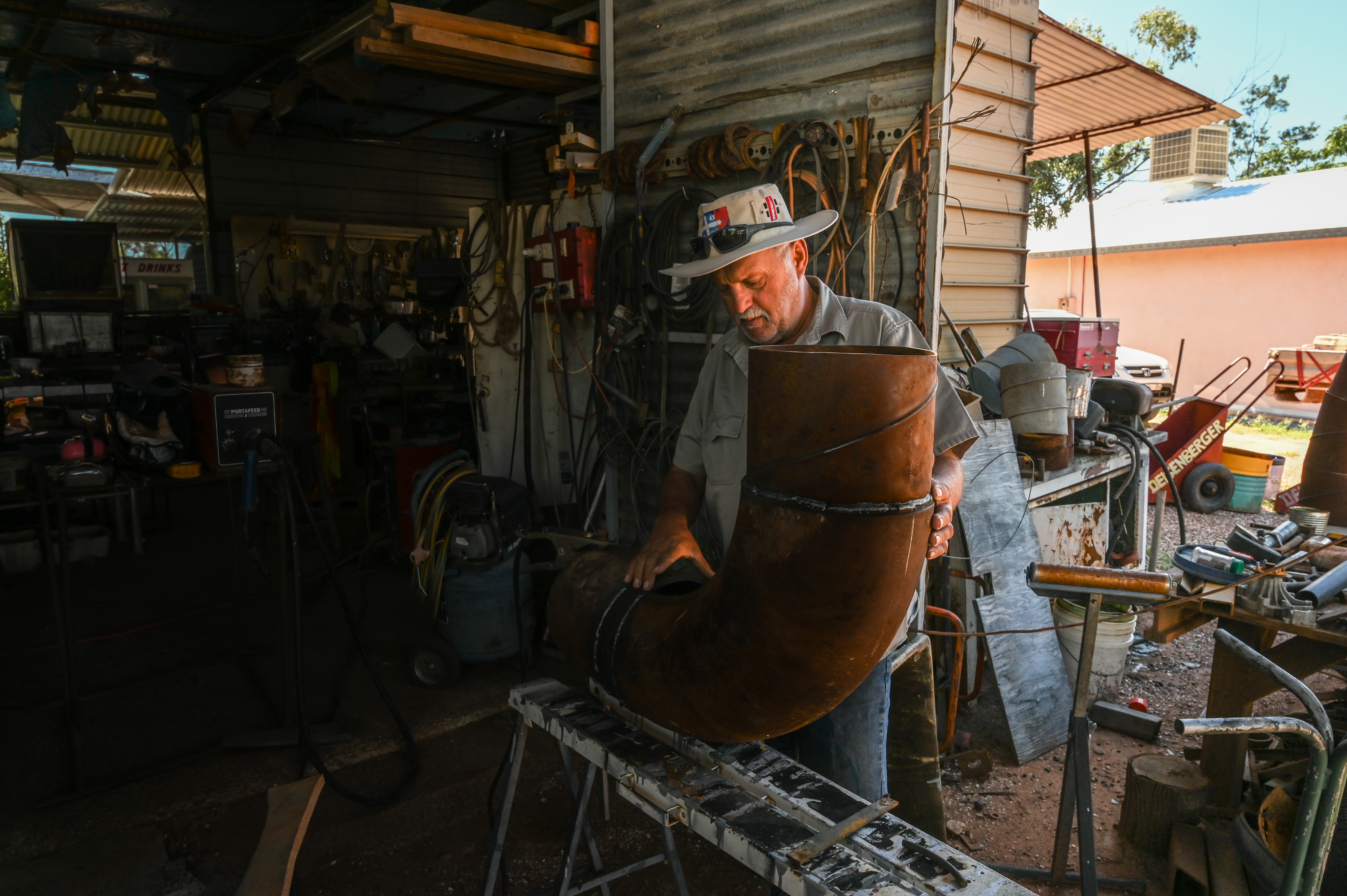 A photo of Sebastian in his workshop, out the back of his house.