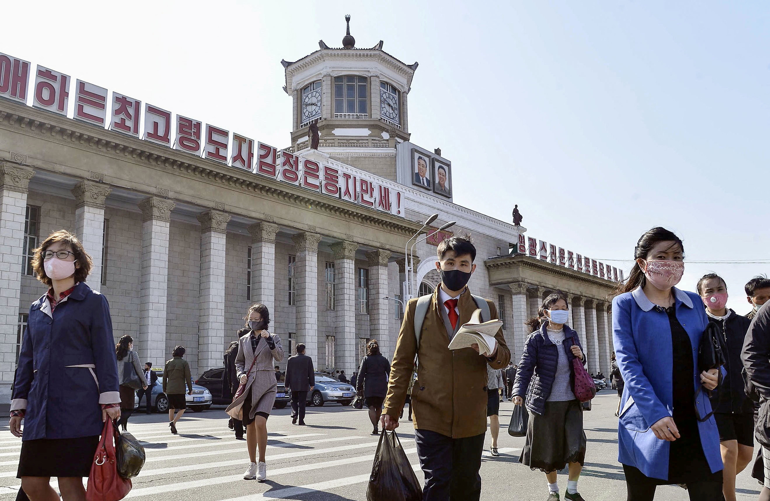 People in masks in Pyongyang