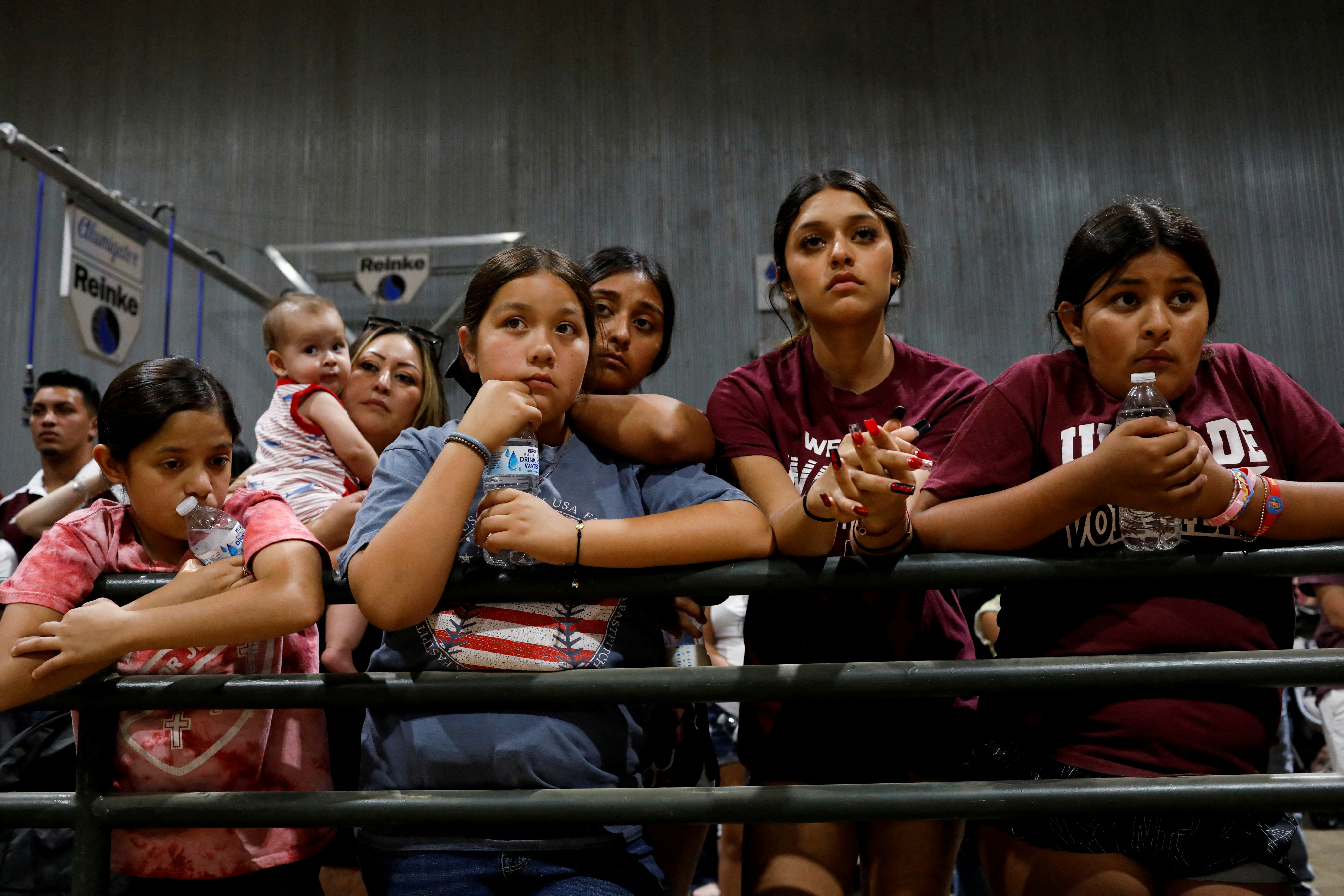 Children and family members attend a vigil for the victims of the Robb Elementary School shooting