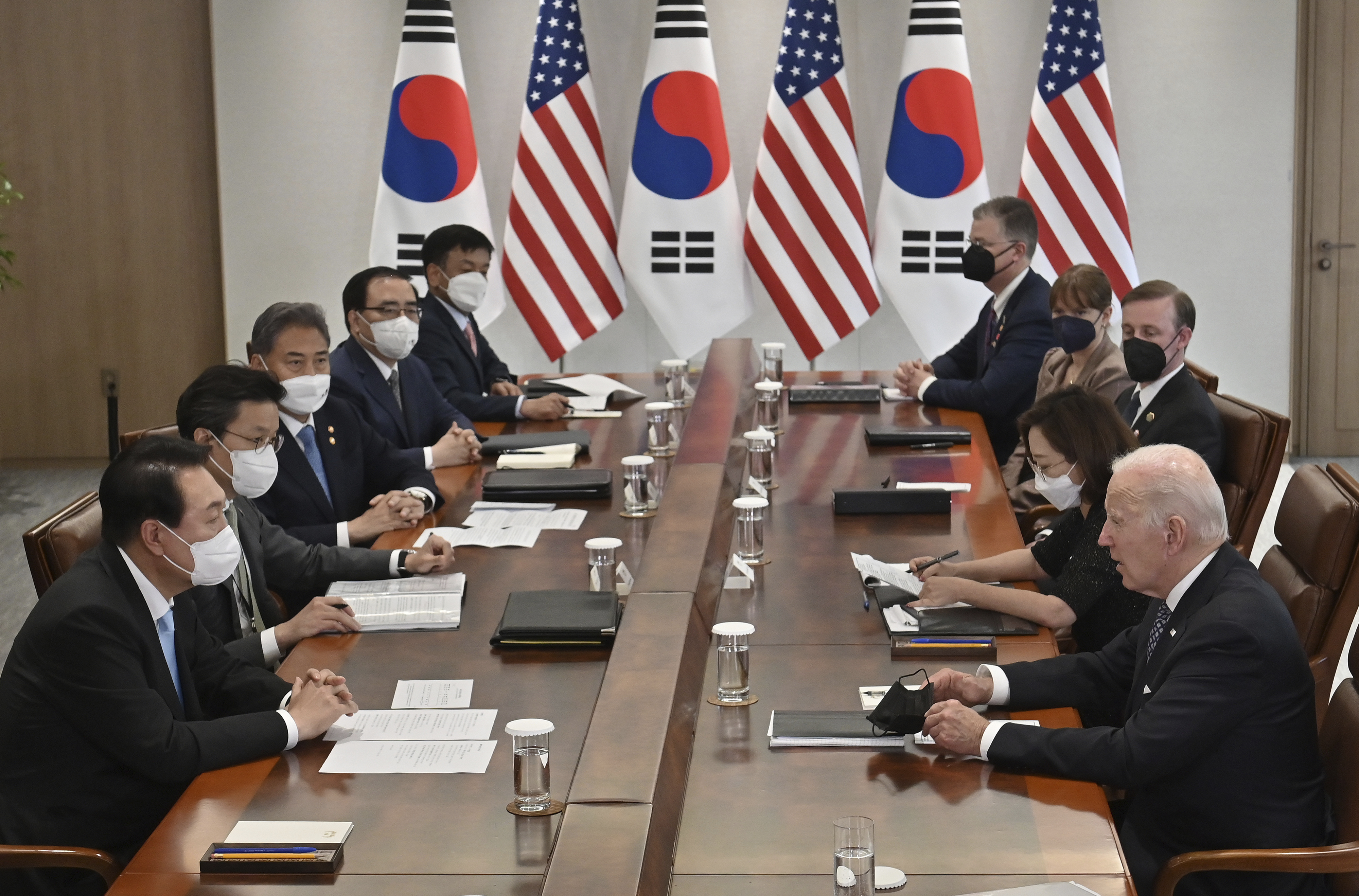 US President Joe Biden talks with South Korean President Yoon Suk Yeol during their meeting at the People's House in Seoul Saturday, May 21, 2022.