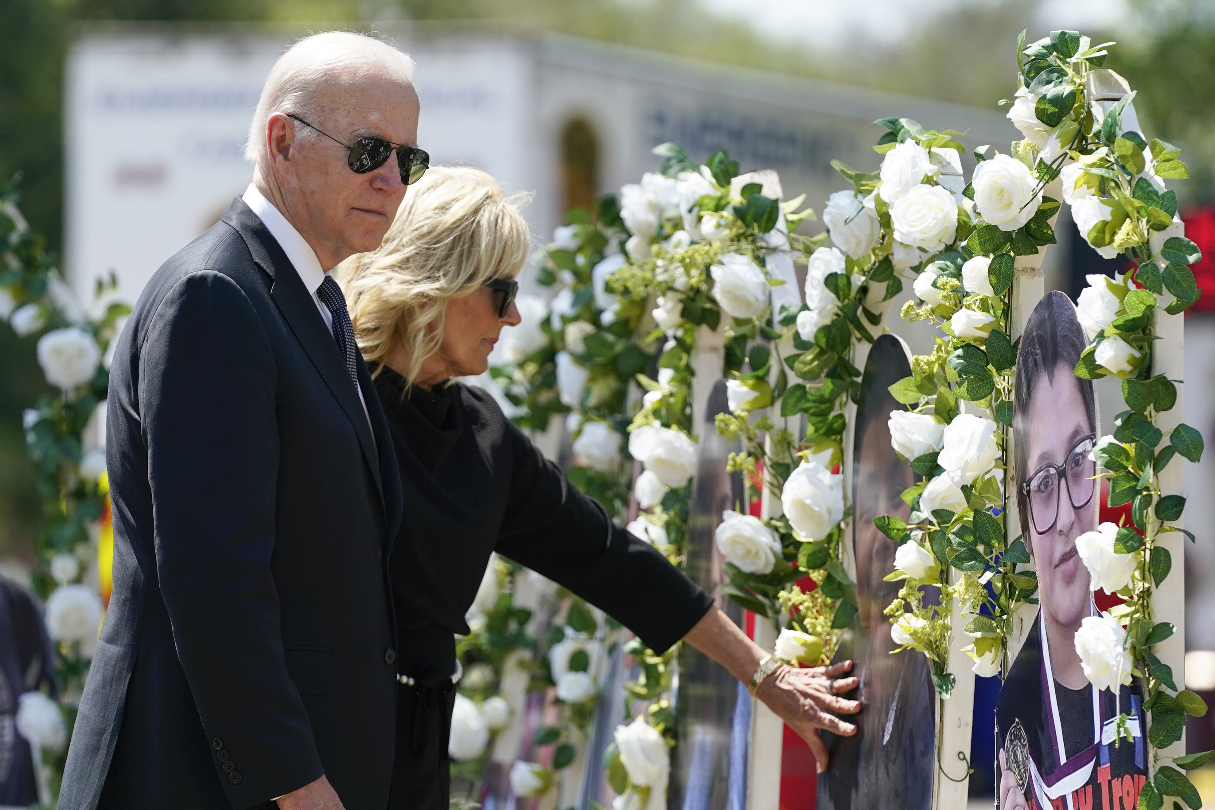 US President Joe Biden and First Lady Jill Biden visit a memorial at Robb Elementary School to victims of the mass shooting in Uvalde, Texas