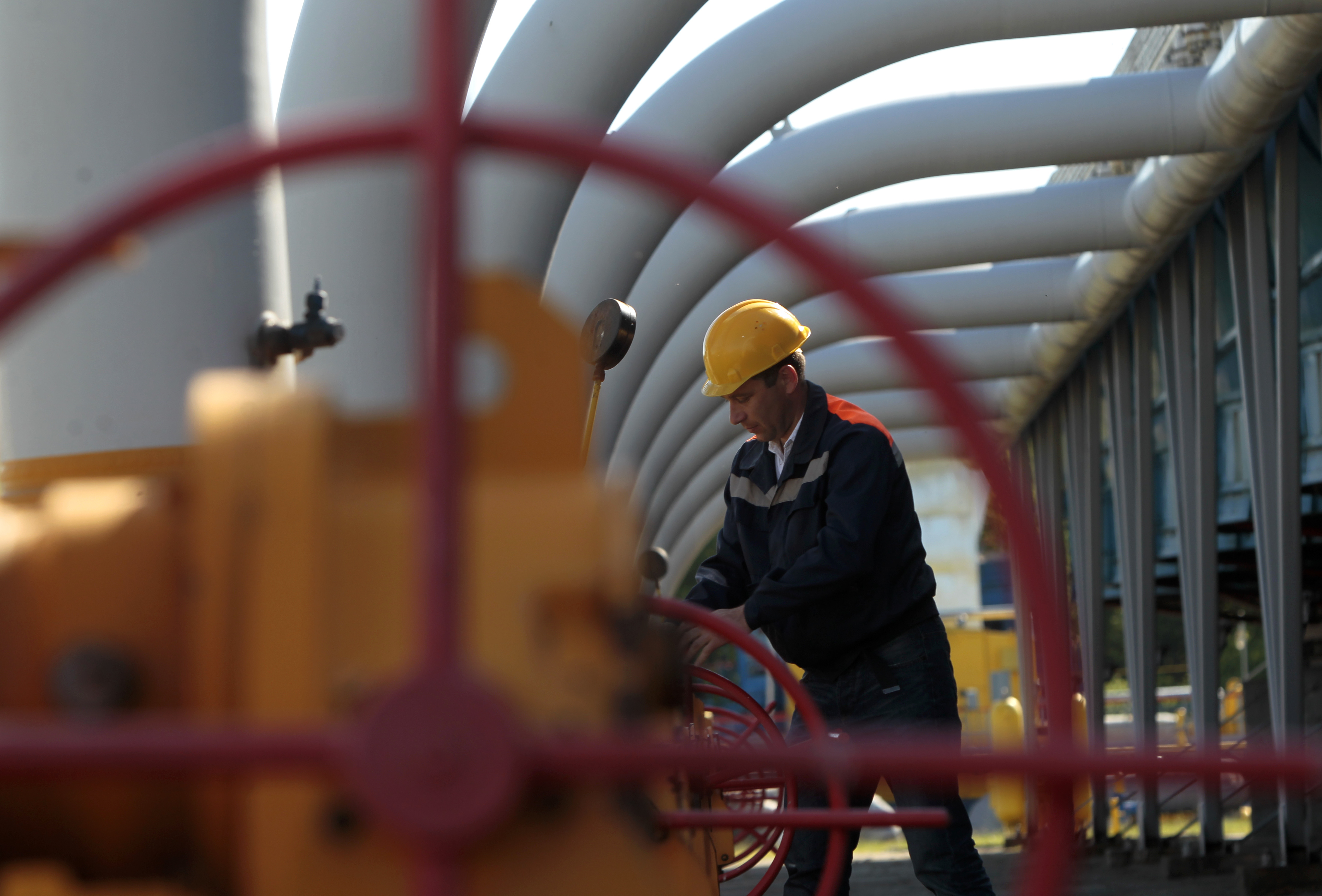 A Ukrainian worker operates valves in a gas storage point in Bil 'che-Volicko-Ugerske underground gas storage facilities in Strij, outside Lviv, Ukraine