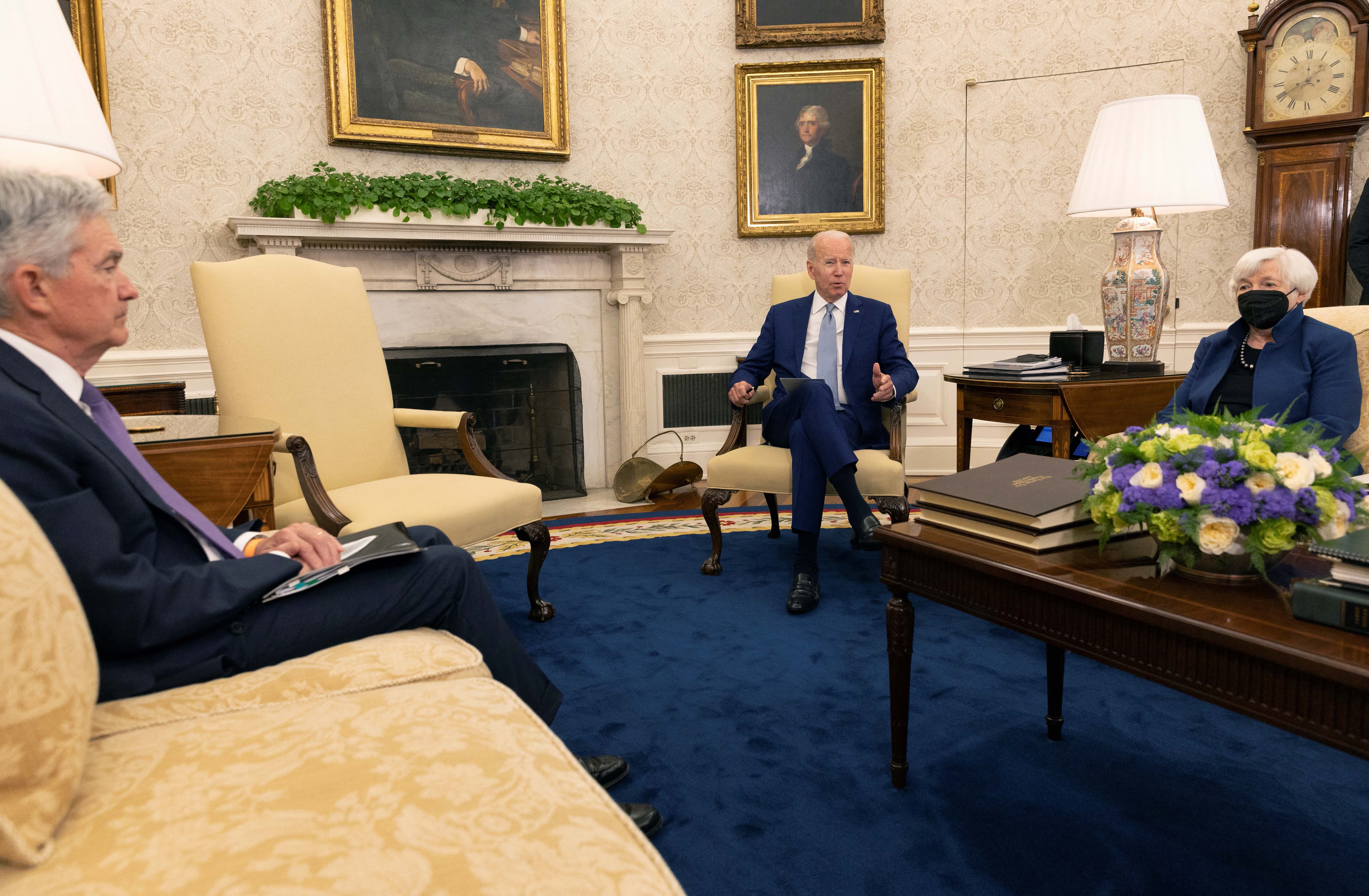 US President Joe Biden meets with Federal Reserve Chair Jerome Powell and U.S. Treasury Secretary Janet Yellen to talk about the economy in the Oval Office at the White House in Washington, D.C., US