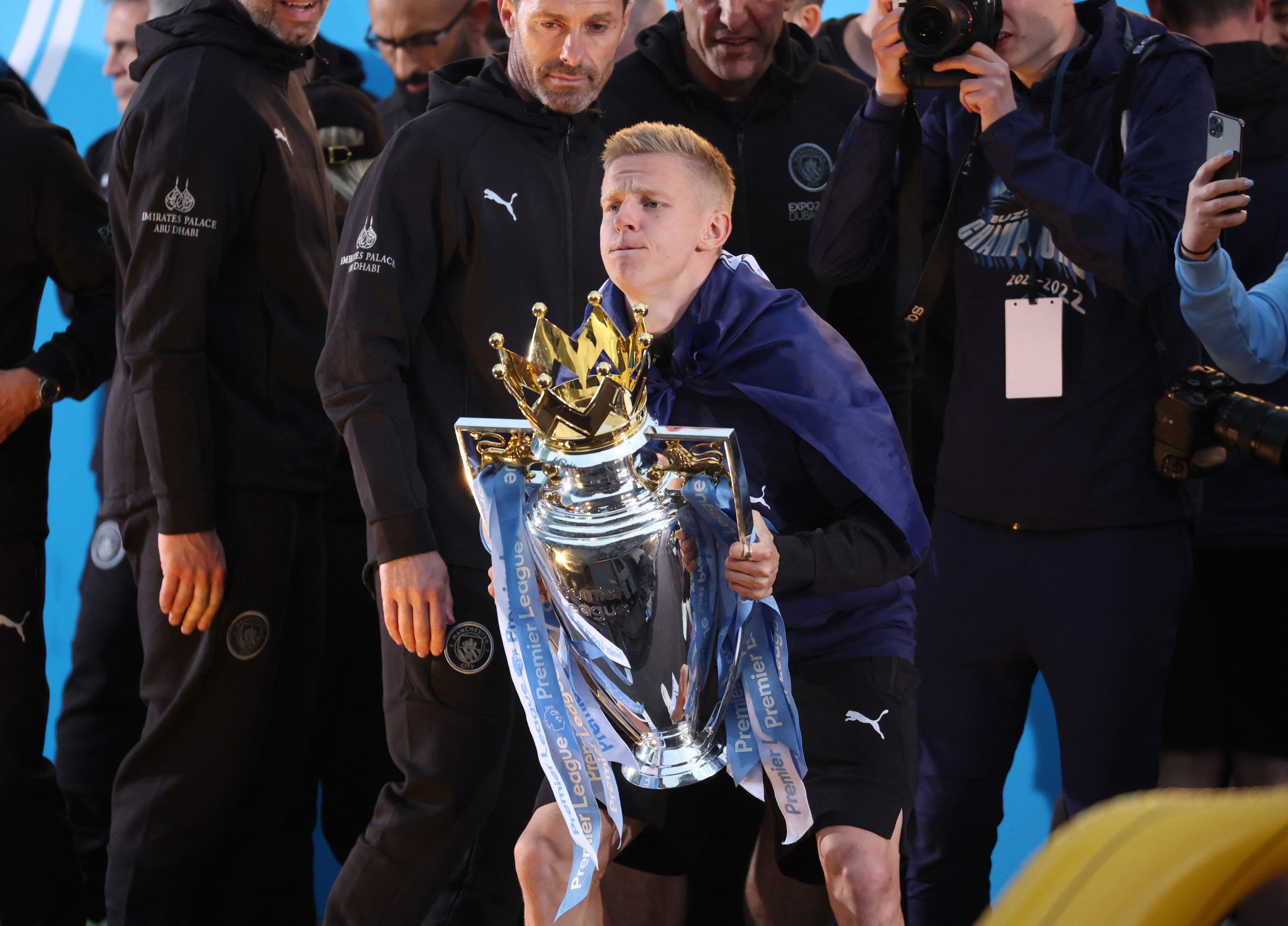 Manchester City's Oleksandr Zinchenko celebrates with the Premier League trophy during the victory ceremony, May 23, 2022