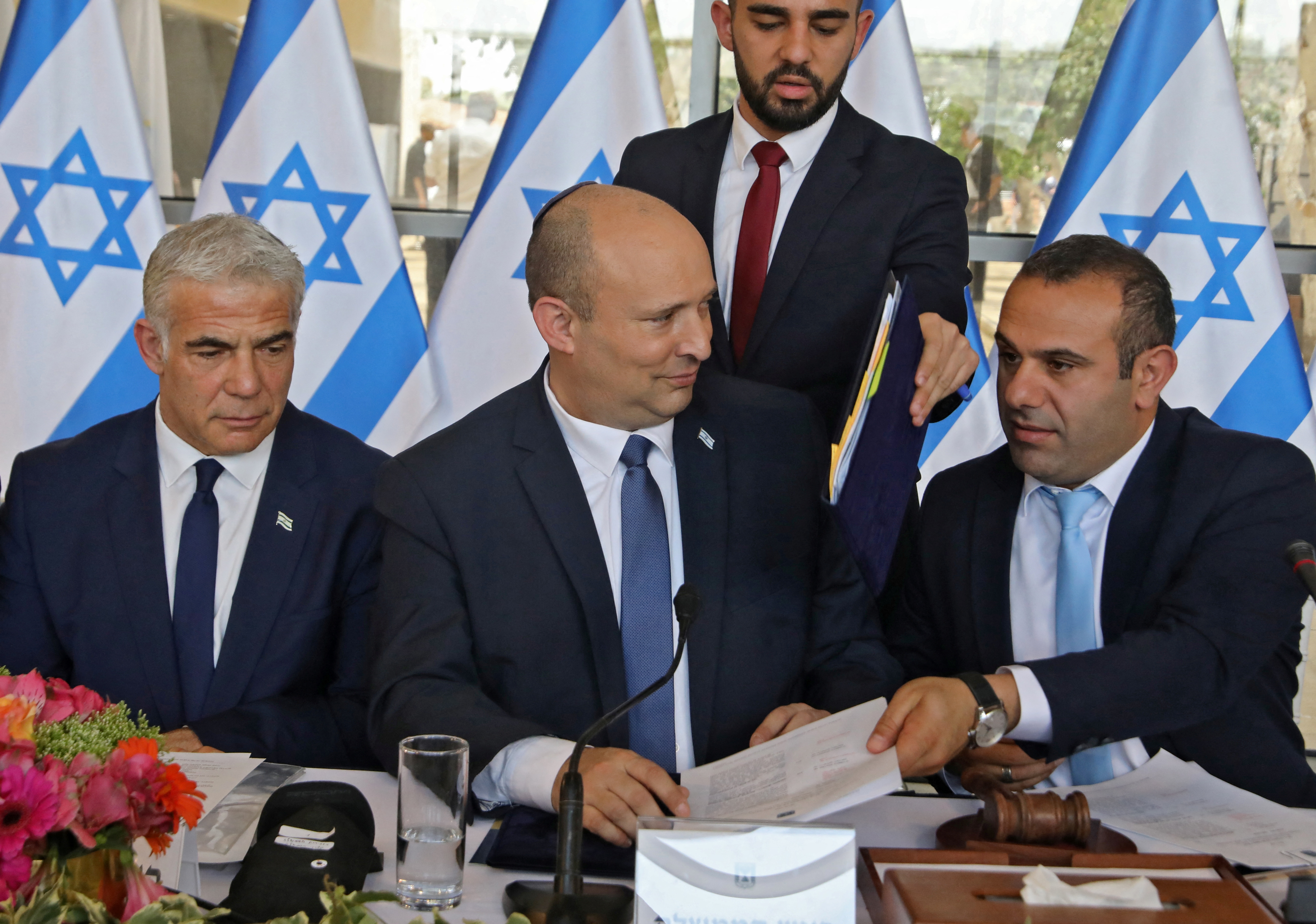 Israeli Foreign Minister Yair Lapid, Prime Minister Nafrali Bennet and politician and Knesset member Abir Kara, attend a weekly cabinet meeting in Jerusalem