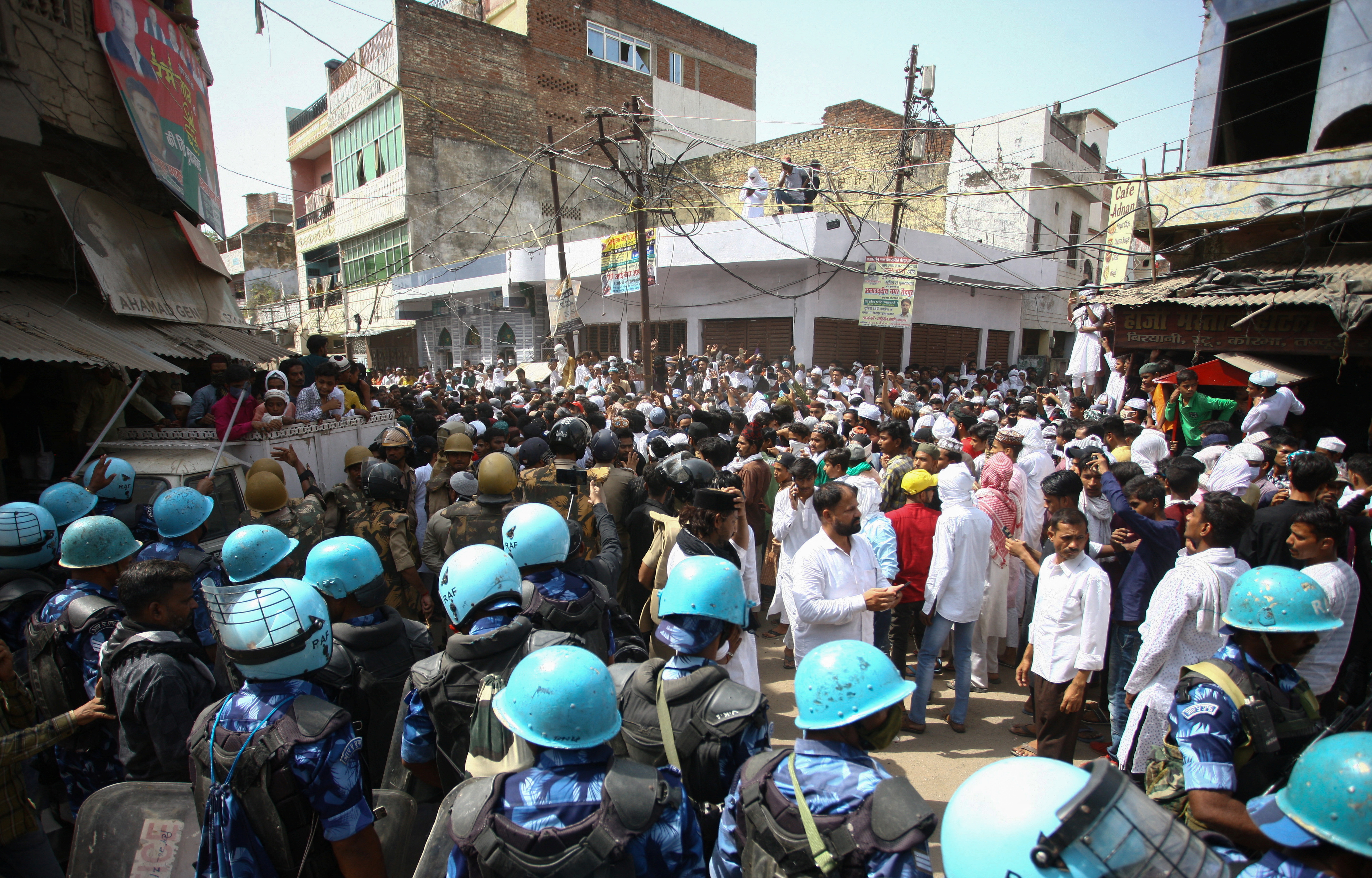 Protestors clash with police during a protest demanding the arrest of Bharatiya Janata Party (BJP) member Nupur Sharma for her comments on Prophet Mohammed, in Prayagraj, India
