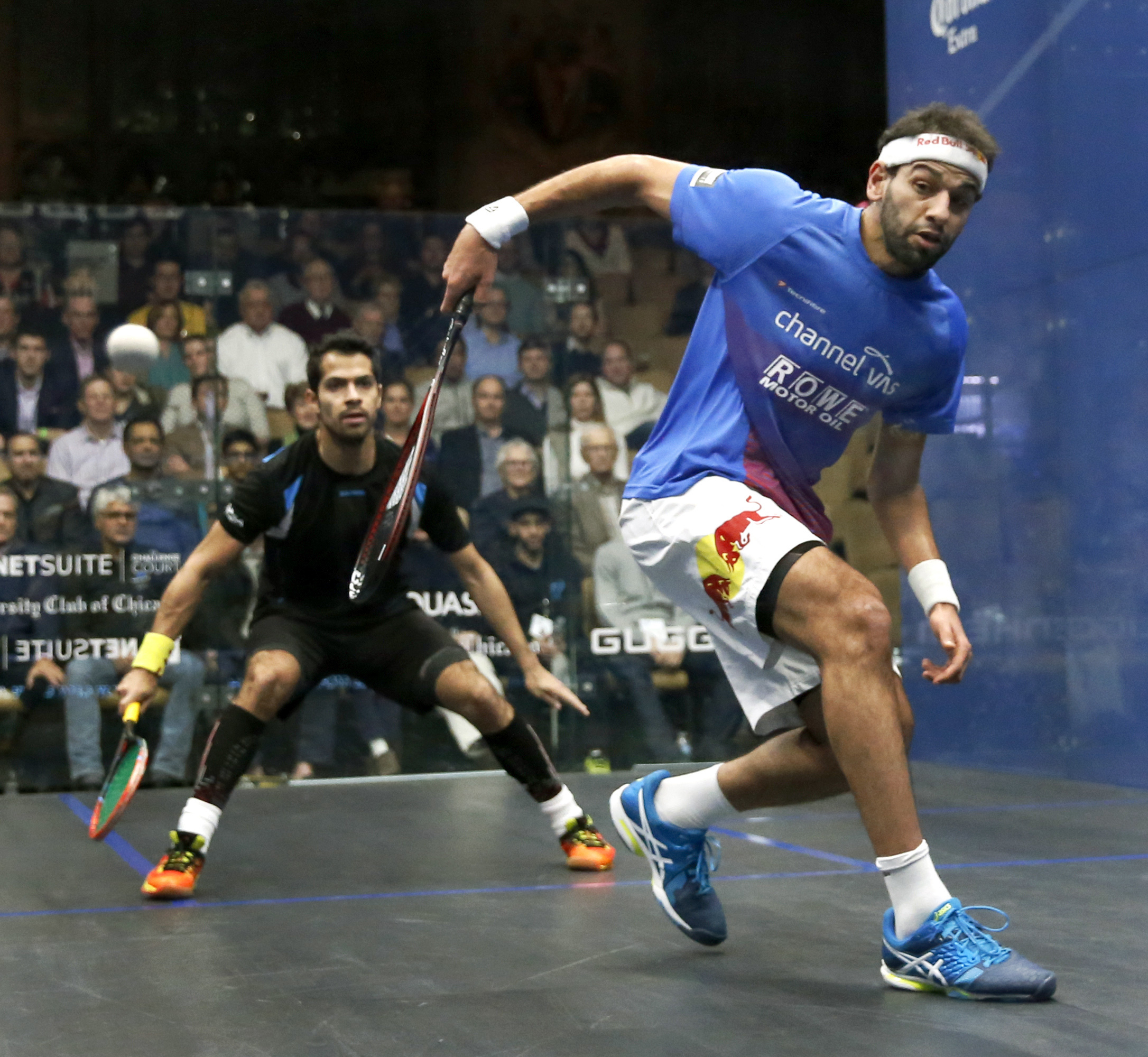 Mohamed Elshorbagy, right, competes against Cesar Salazar, from Mexico, in 2017 [File photo: Charles Rex Arbogast/AP]