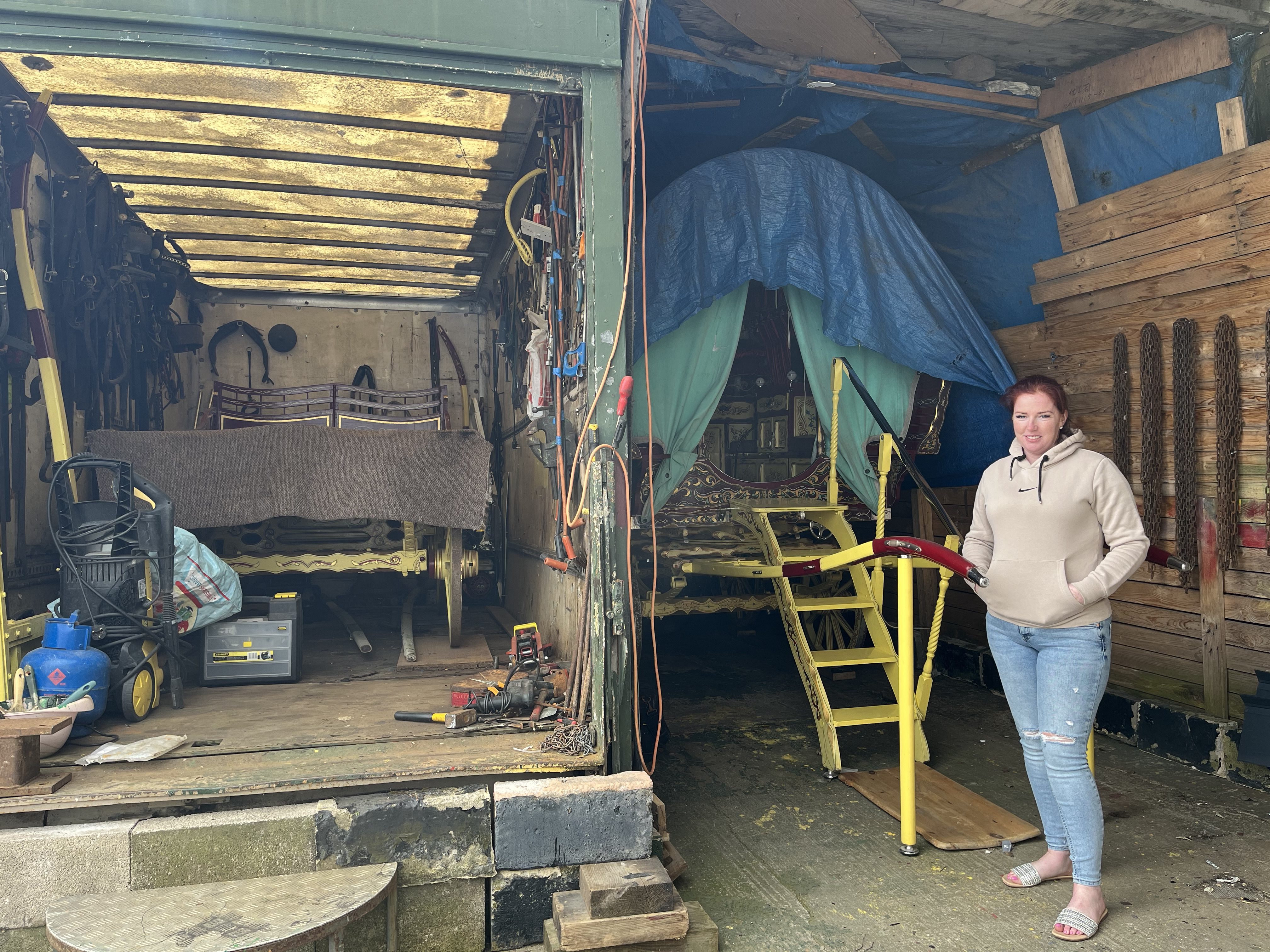 A Traveller woman with a bow top wagon