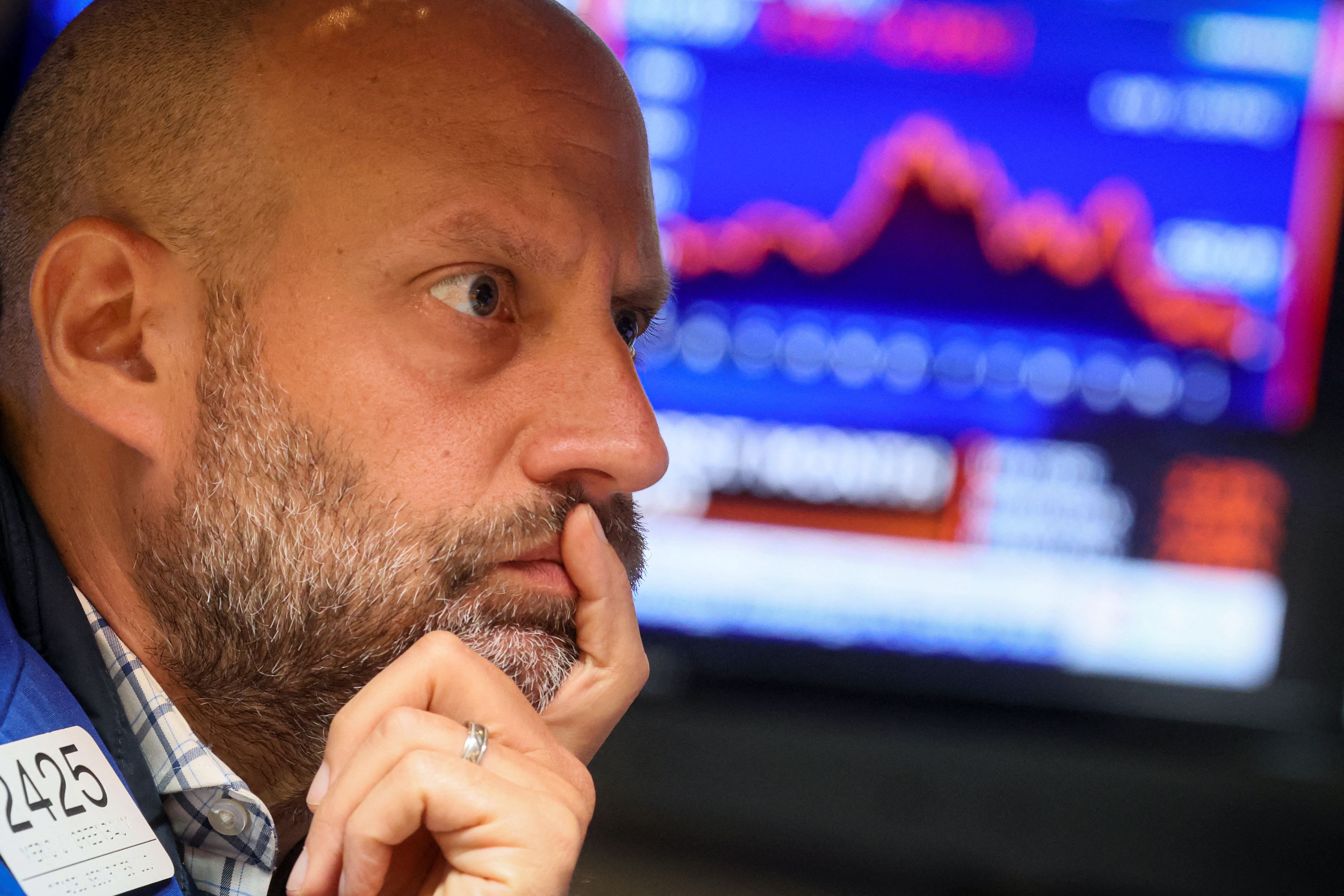 A specialist trader works on the floor of the New York Stock Exchange (NYSE) in New York City, U.S.