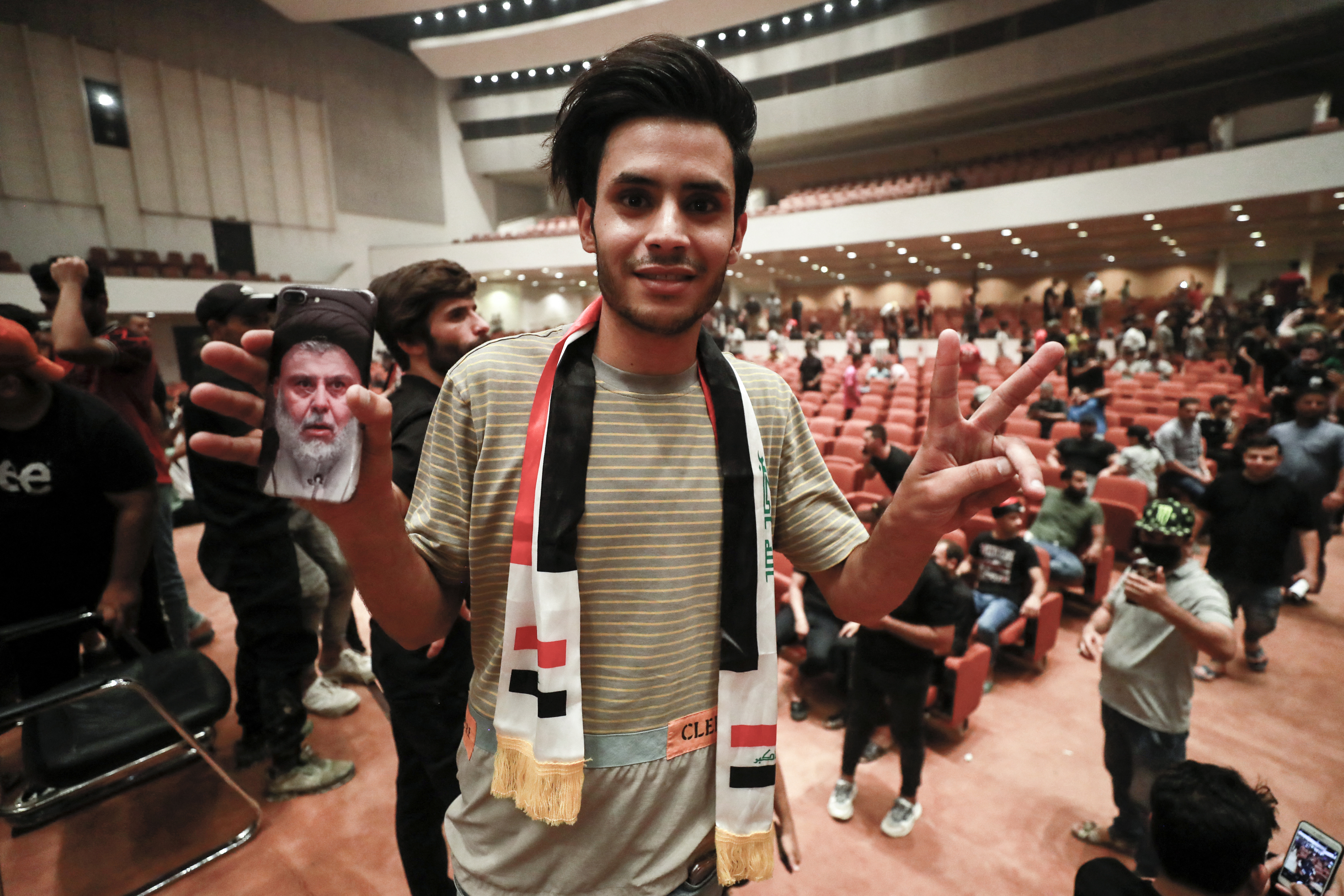 Supporters of the Iraqi cleric Moqtada Sadr gather inside the Iraqi parliament