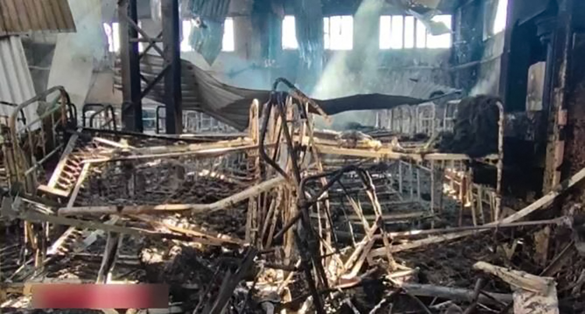 This handout picture released by the Russian Investigative Committee on July 29, 2022 shows what is said is the destroyed detention centre in the settlement of Olenivka in the separatist-held region of Donetsk.