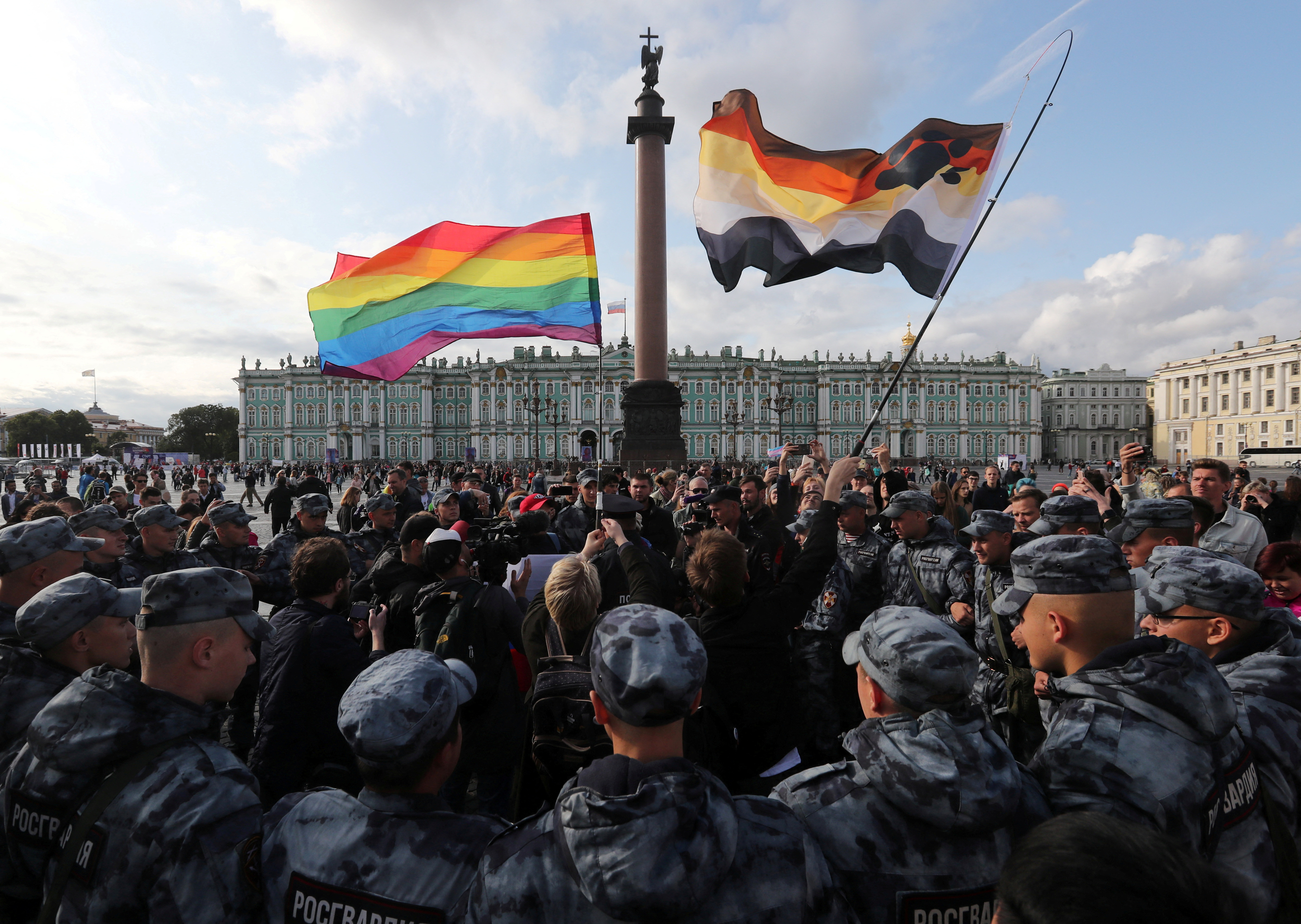 FILE PHOTO: Law enforcement officers block participants of the LGBT community rally "X St.Petersburg Pride" in central Saint Petersburg, Russia August 3, 2019.