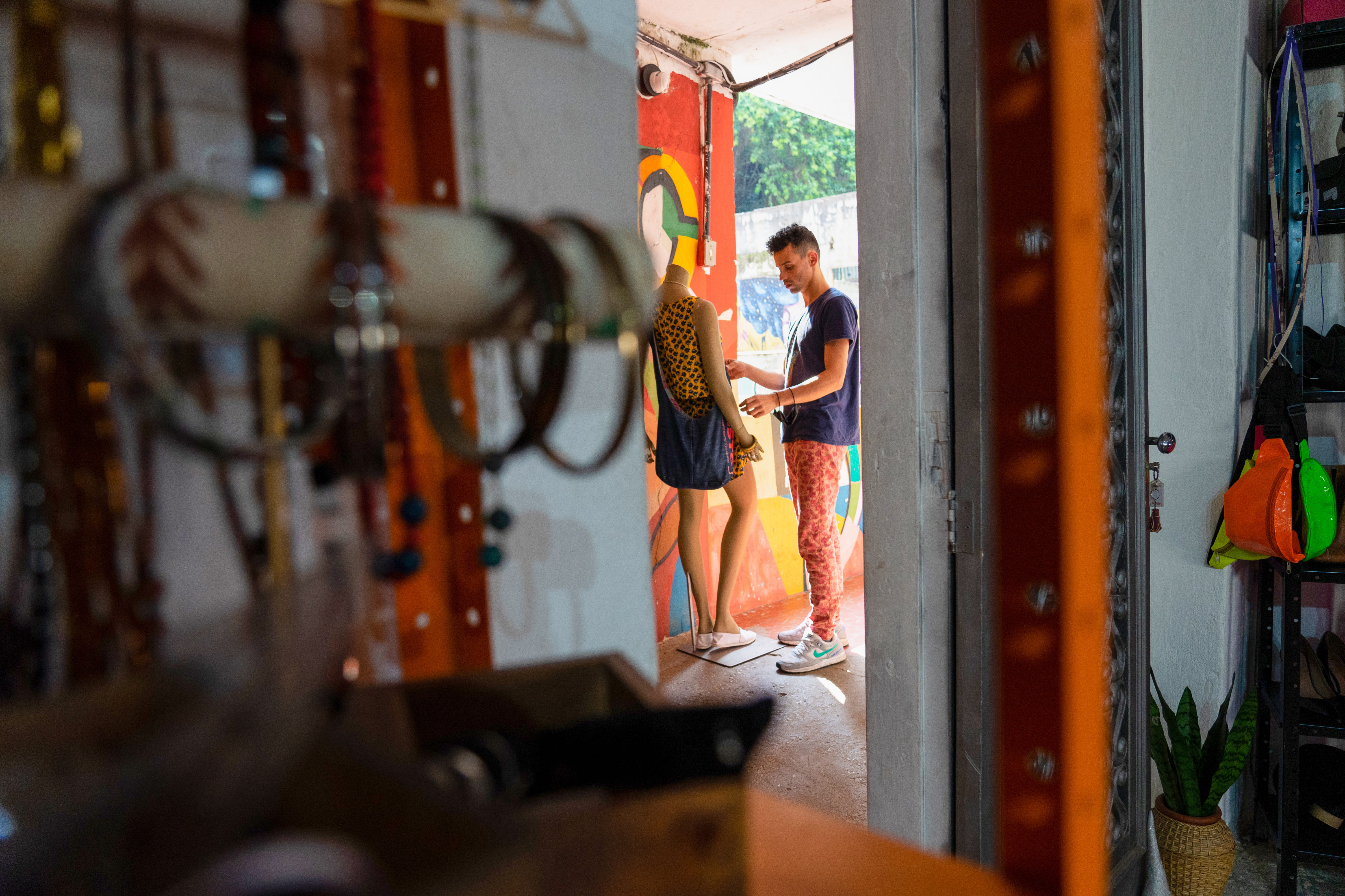 Filipe Figueiredo works in the occupation's clothing store,