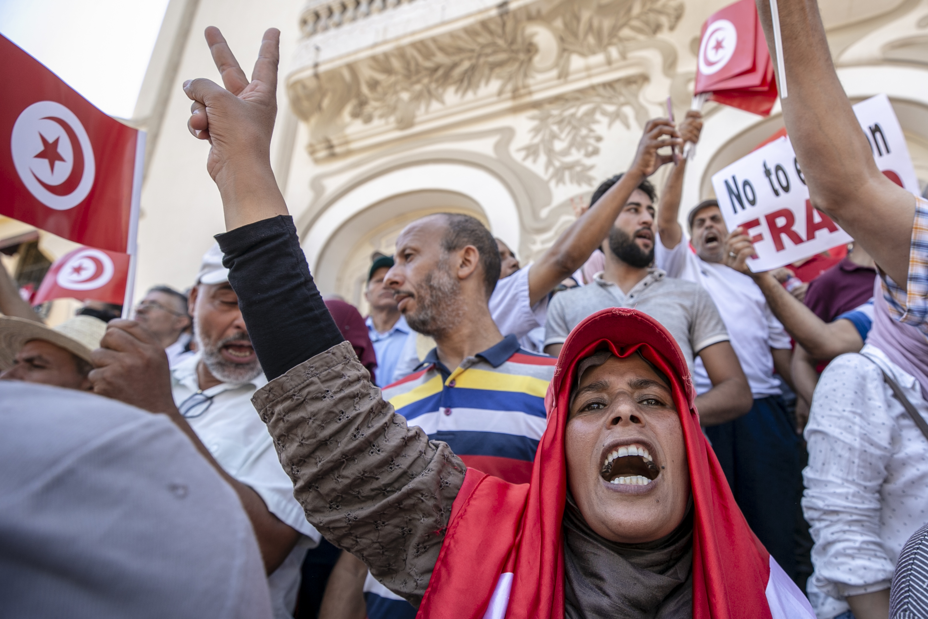 People gather at Habib Burgiba Avenue to stage a protest against the referendum