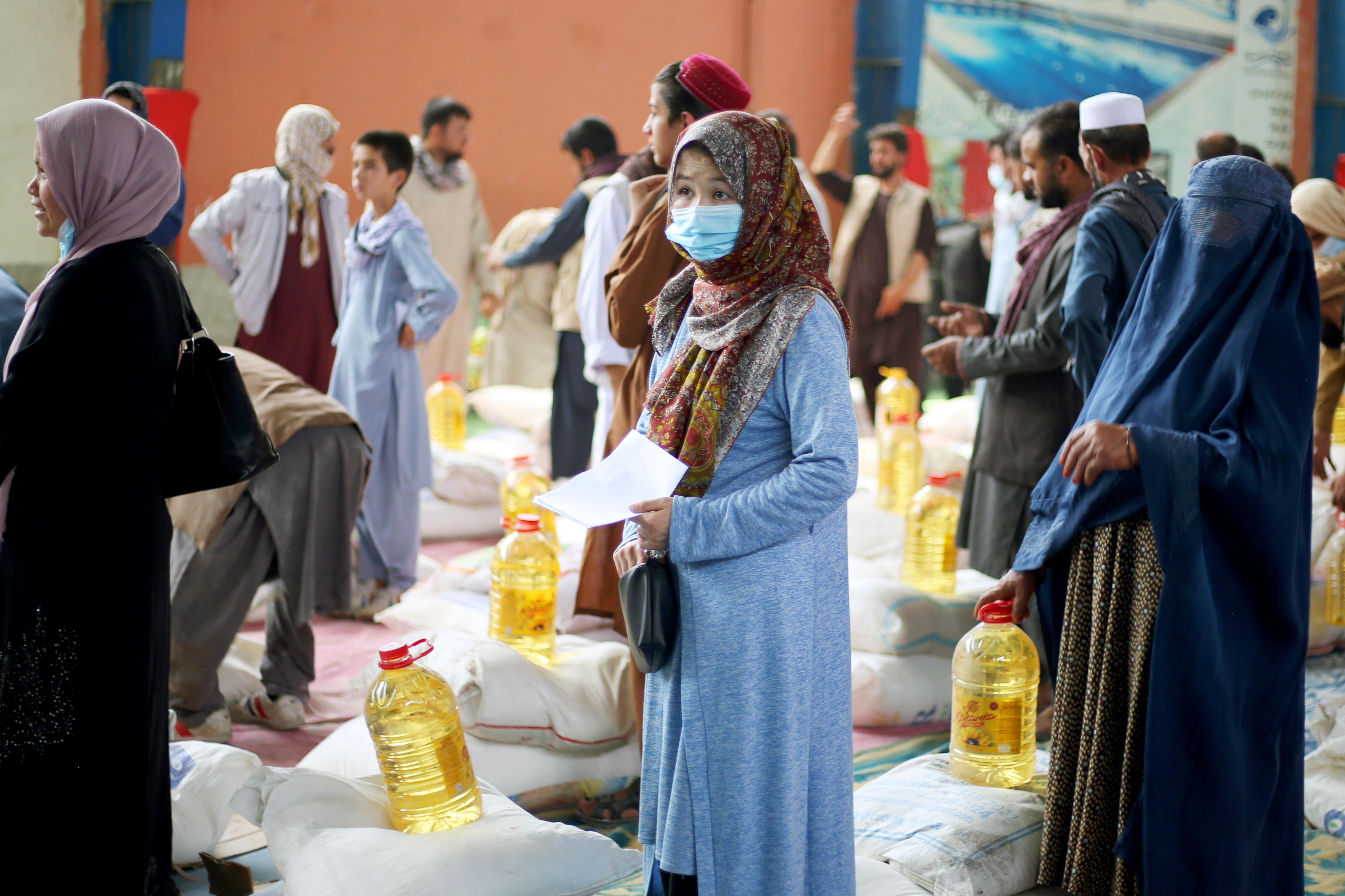 A recipient of a donor pack after the earthquakein Afghanistan last month