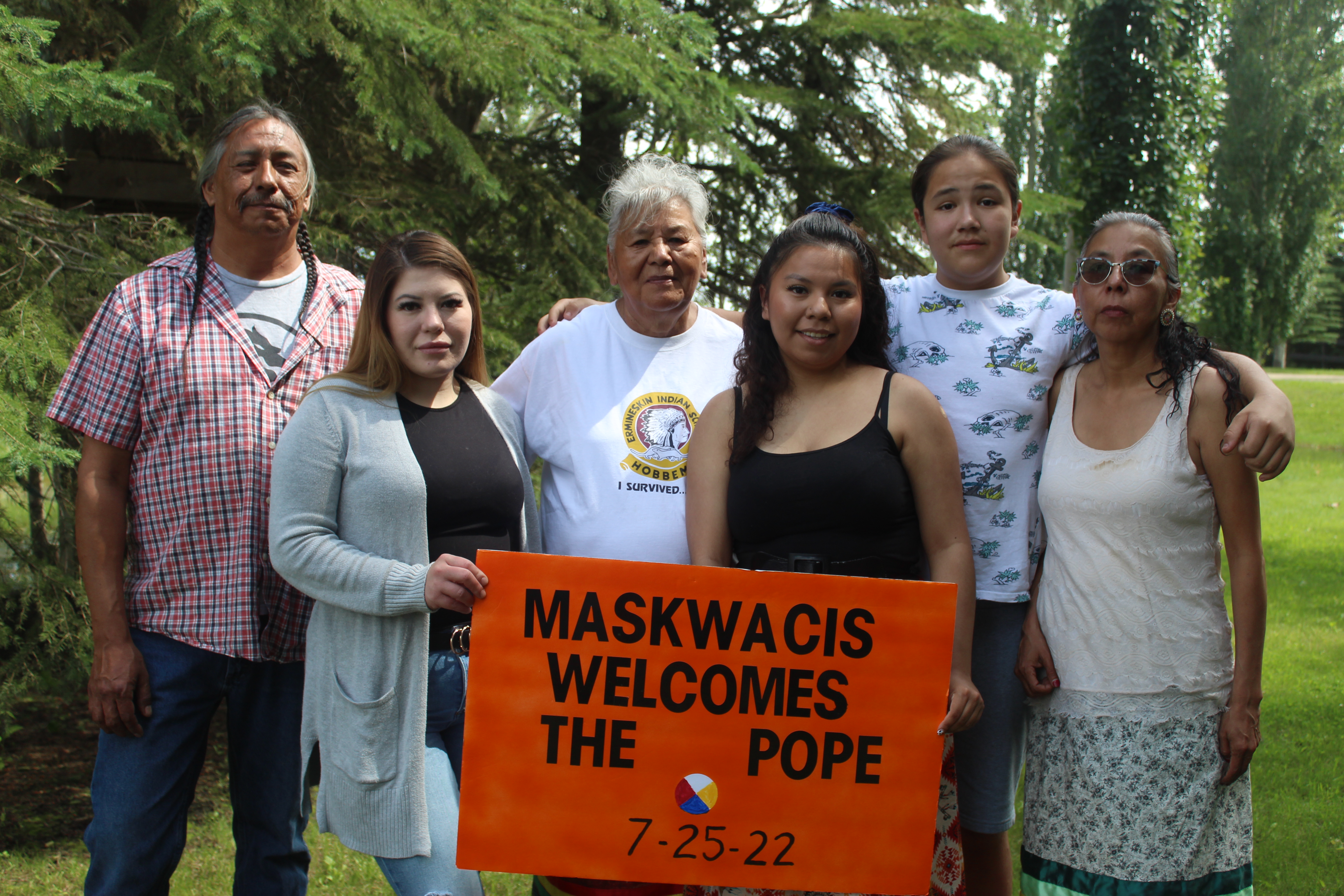 Flora with her son and grandchildren