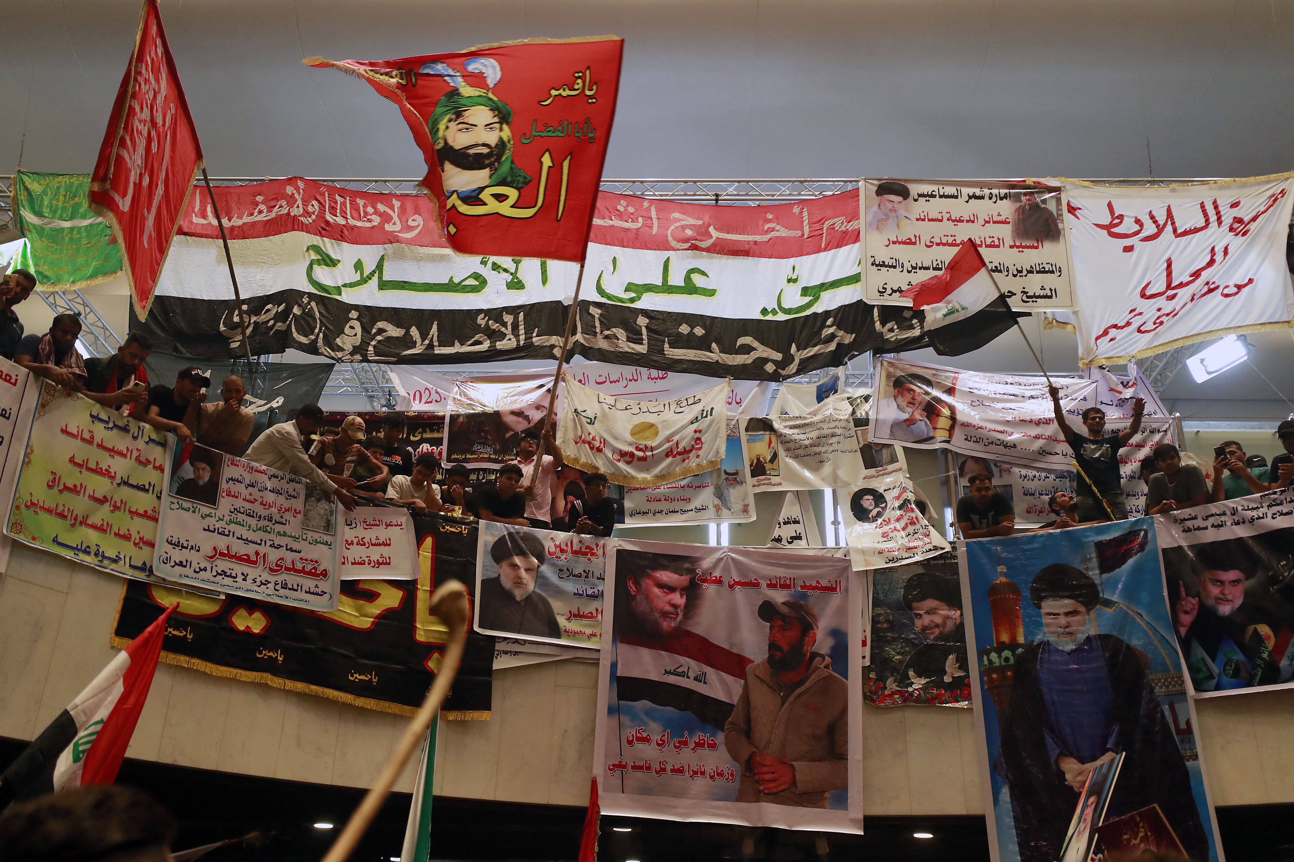Supporters of Iraqi leader Muqtada al-Sadr, protesting against a rival bloc's nomination for prime minister, continue their sit-in inside Iraq's parliament in Baghdad's Green Zone