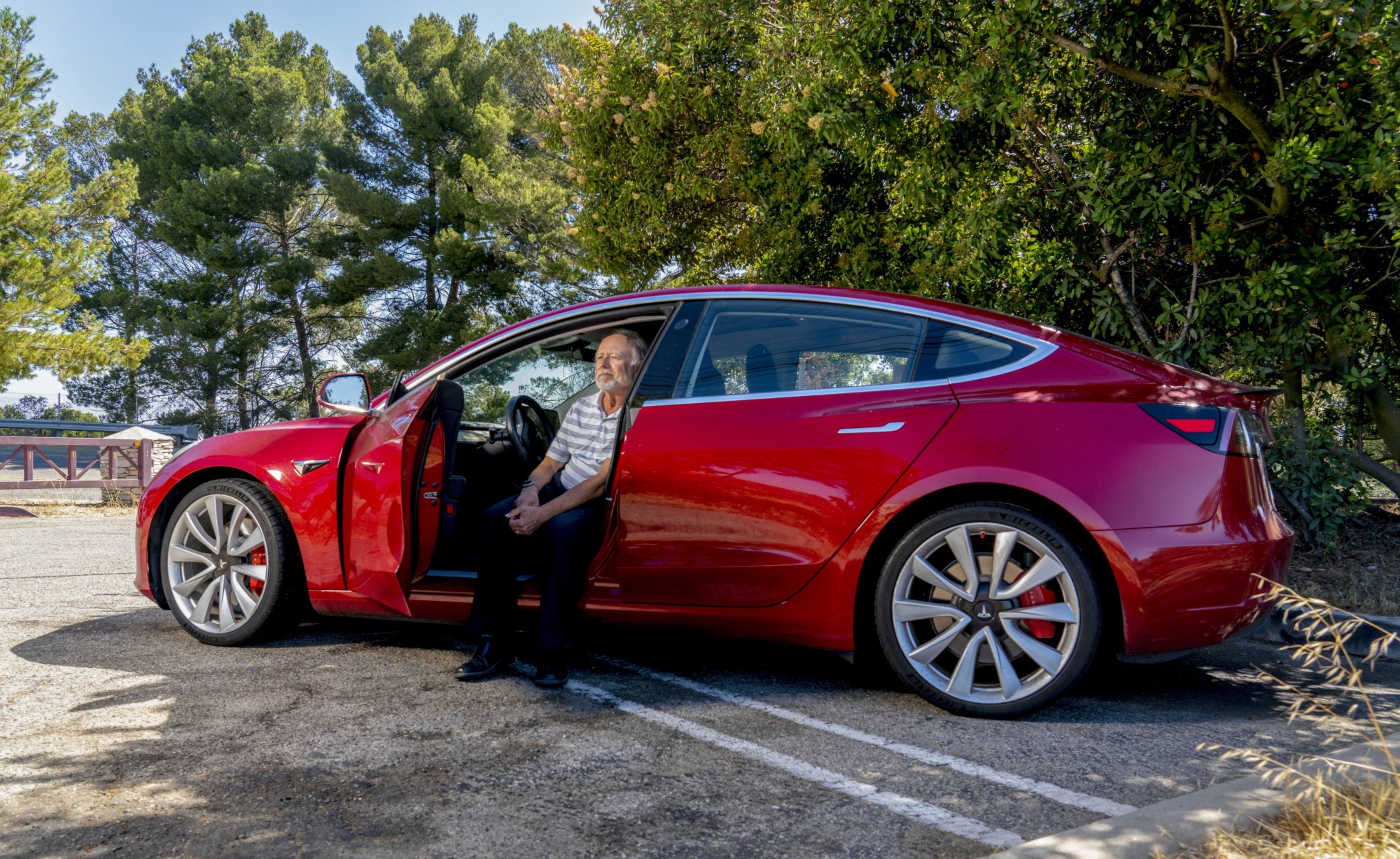 Dennis Levitt in his Tesla Model S.