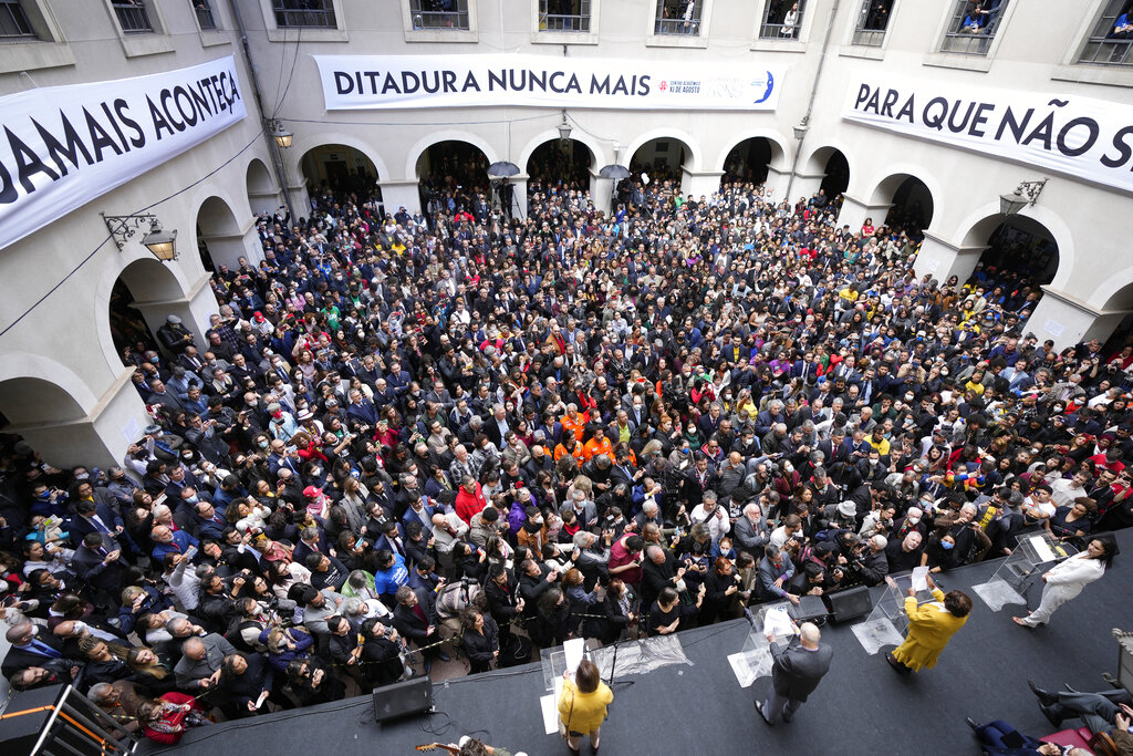 People attend the reading of one of two manifestos defending the Brazil's democratic institutions and electronic voting system outside the Faculty of Law at Sao Paulo University in Sao Paulo, Brazil.