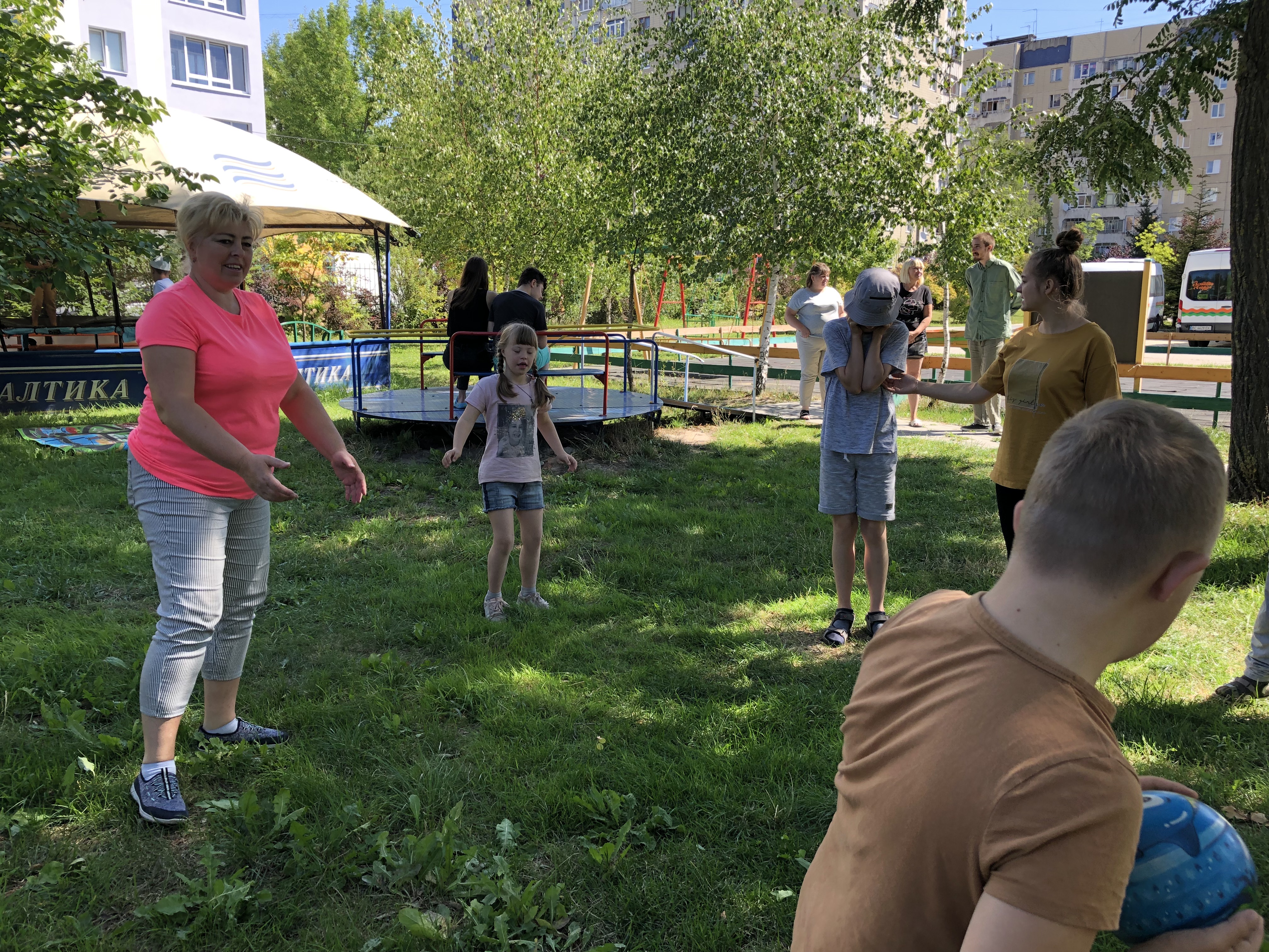 A photo of people outdoors playing.