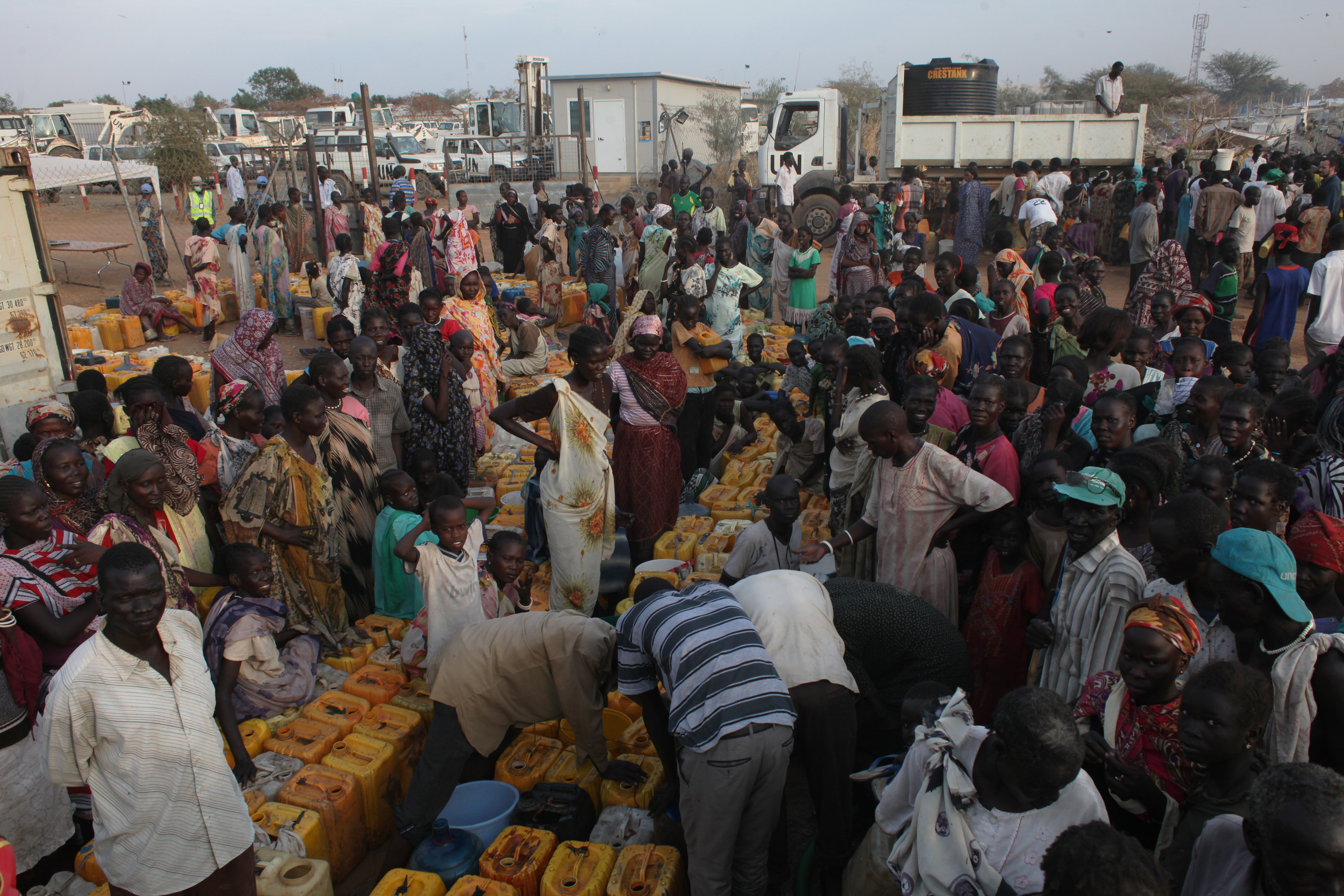 People wait for water inside de POC (protection of civilians site) in Malakal, South Sudan, on March 3rd, 2014.