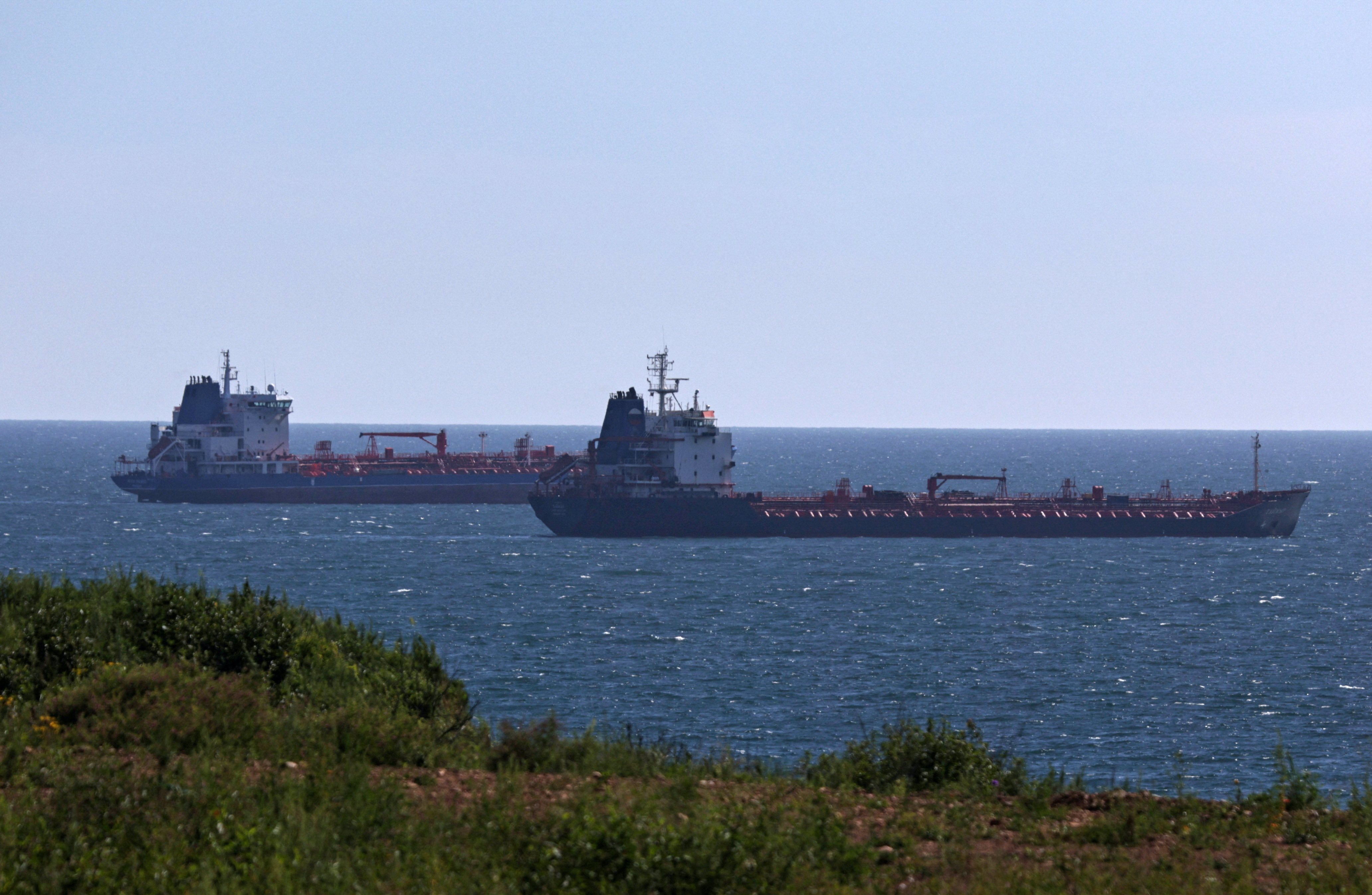 Oil tankers sail along Nakhodka Bay near the port city of Nakhodka, Russia