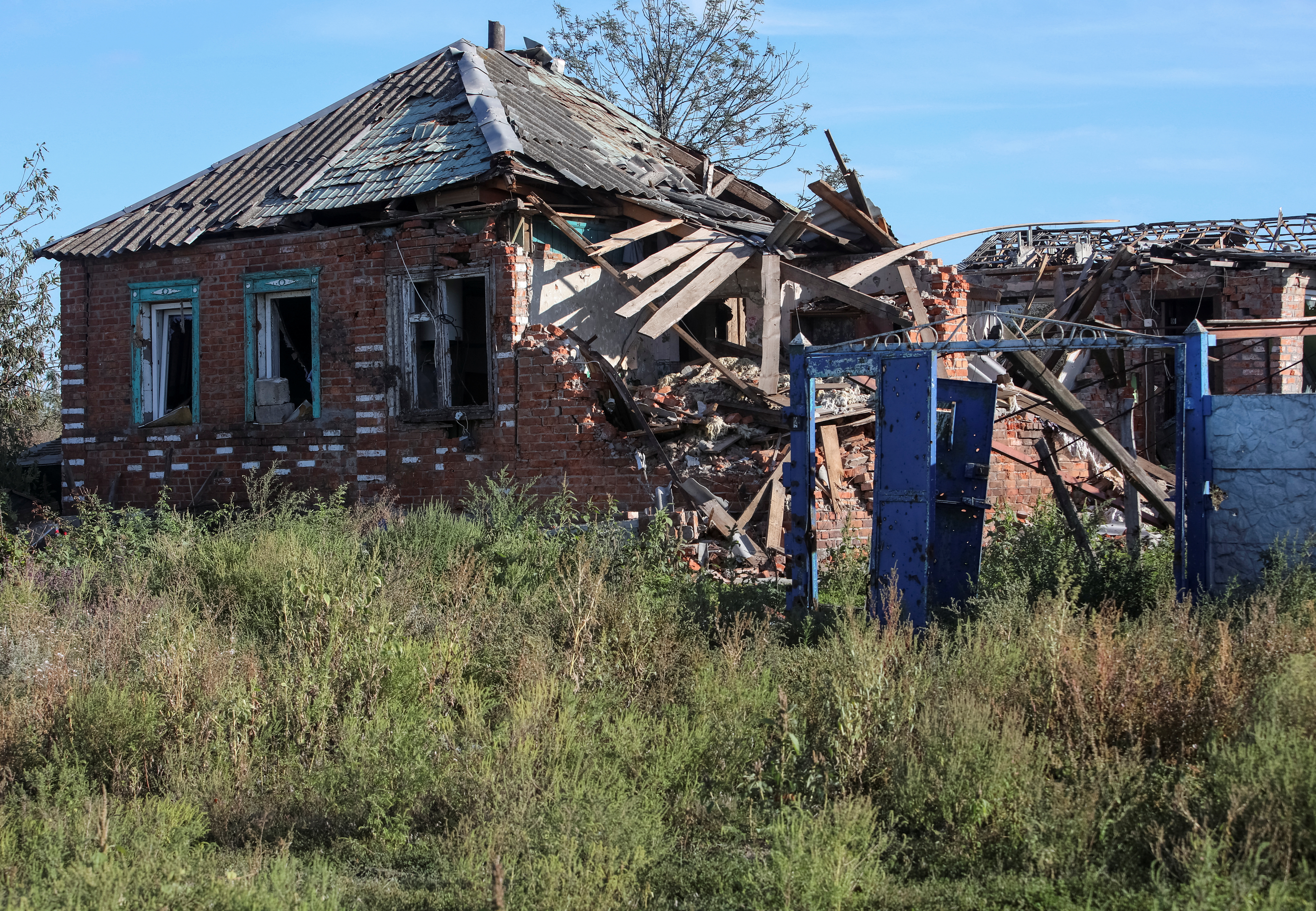 A house damaged in shelling in Ukraine's Kharkiv region