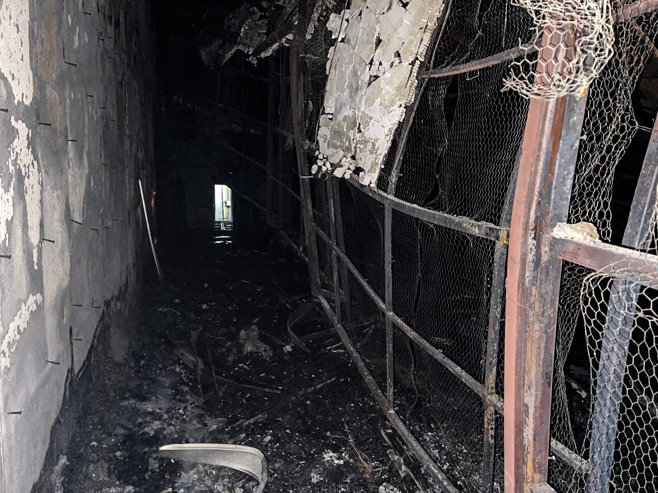 This image obtained from the Iranian news agency IRNA on October 16, 2022, shows damage caused by a fire inside the building of the Evin prison, in the northwest of the Iranian capital Tehran. - The unrest at the prison came as Iran has been rocked by weeks of protests since Mahsa Amini's death on September 16, three days after she was arrested by morality police in Tehran for allegedly violating the country's strict dress code for women.