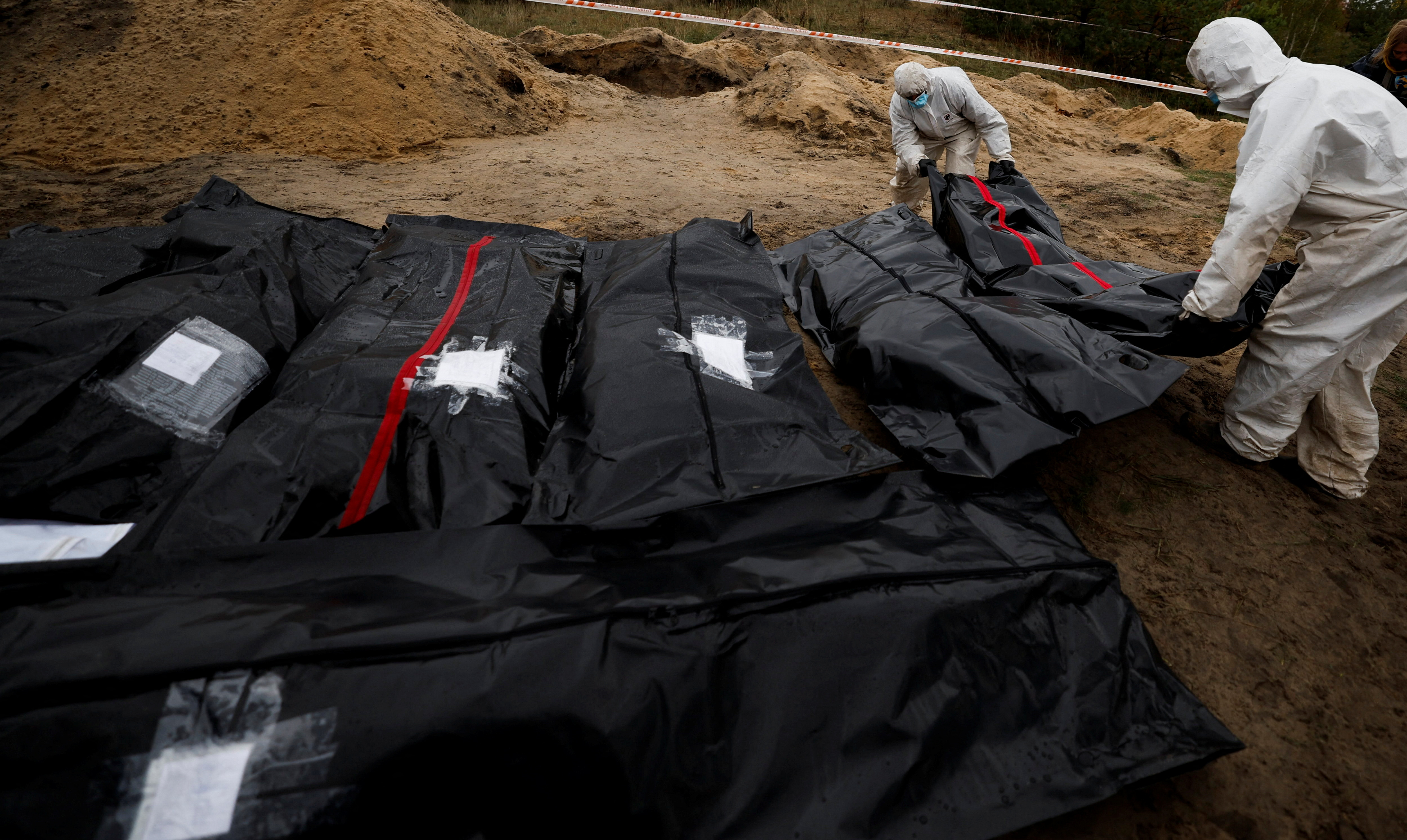mass grave in Lyman, Ukraine