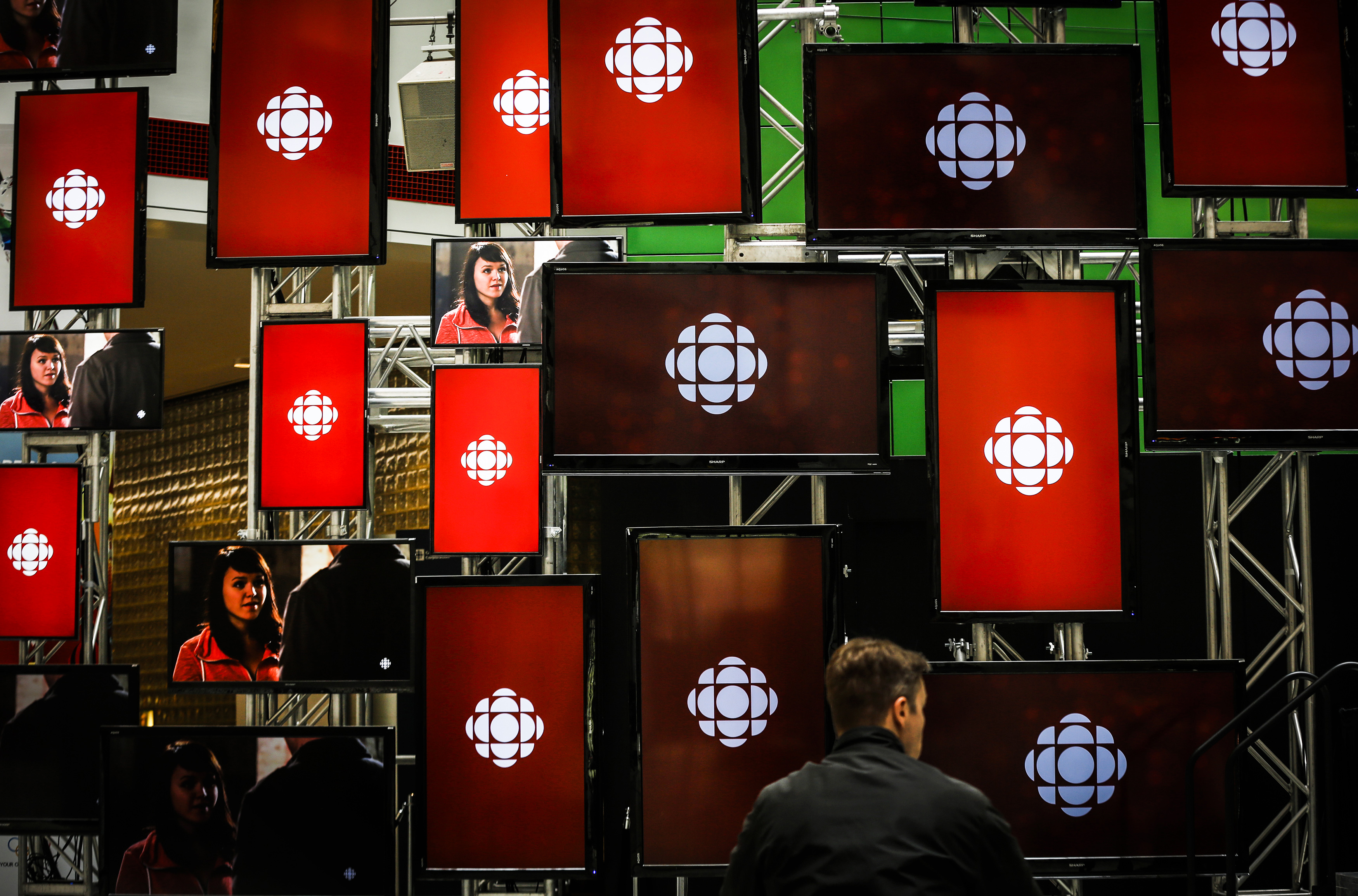 A man sits inside the CBC main office in Toronto, Canada