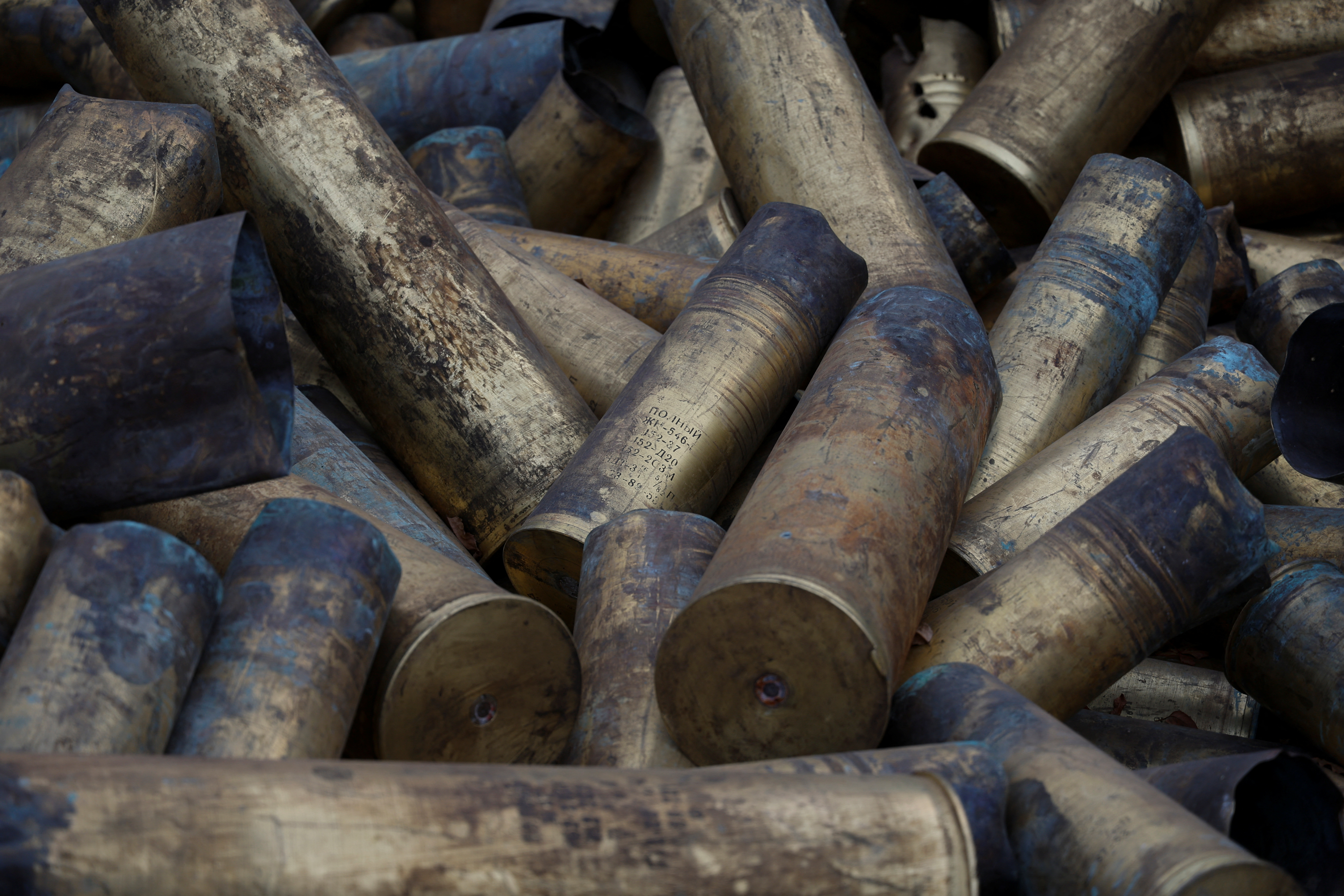 Used Russian artillery shells are seen at a compound of an international airport
