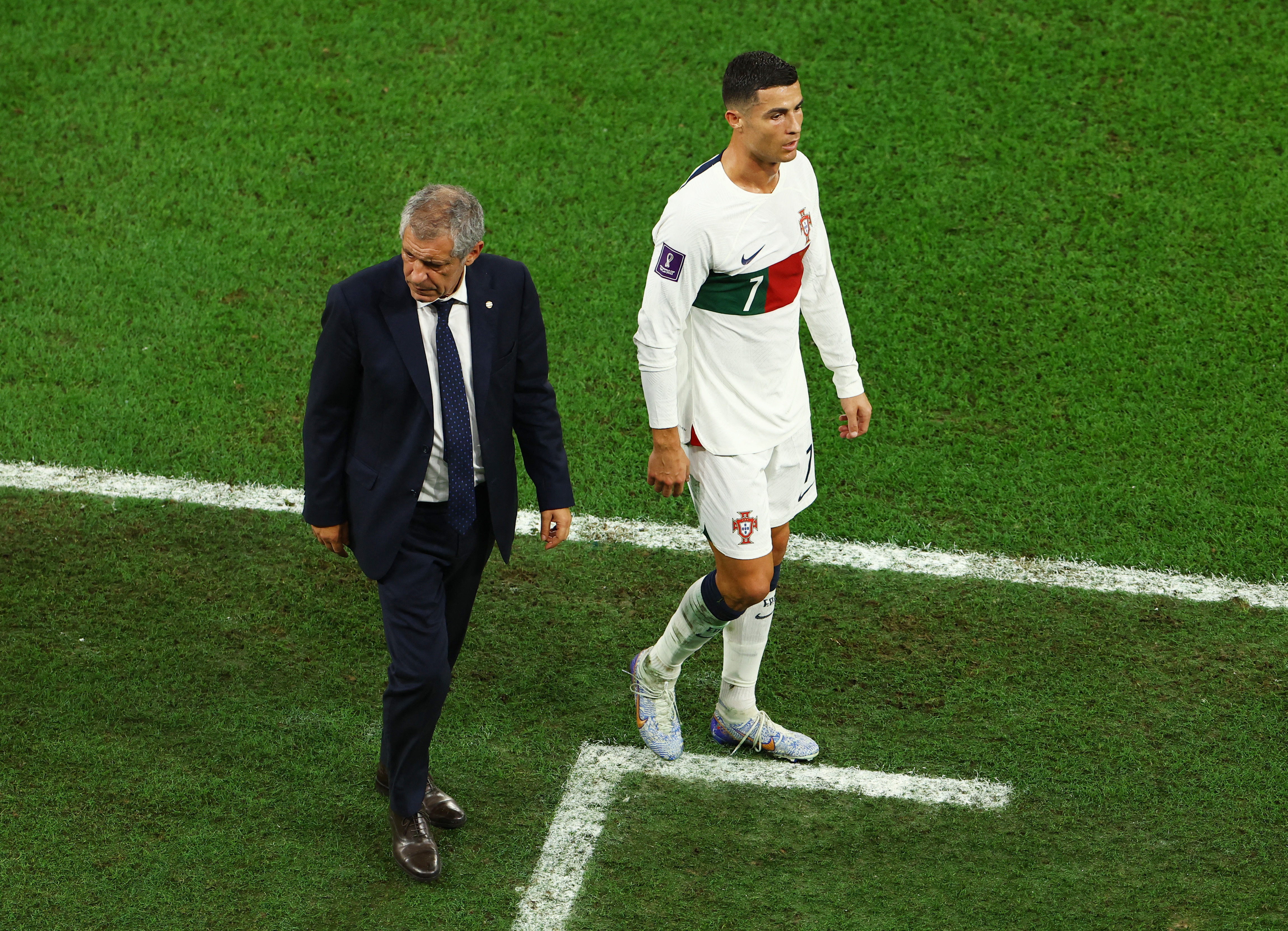 Portugal's coach Fernando Santos with Ronaldo after being substituted during the South Korea v Portugal match at Education City Stadium, Al Rayyan, Qatar on December 2. 2022 [Molly Darlington/Reuters]