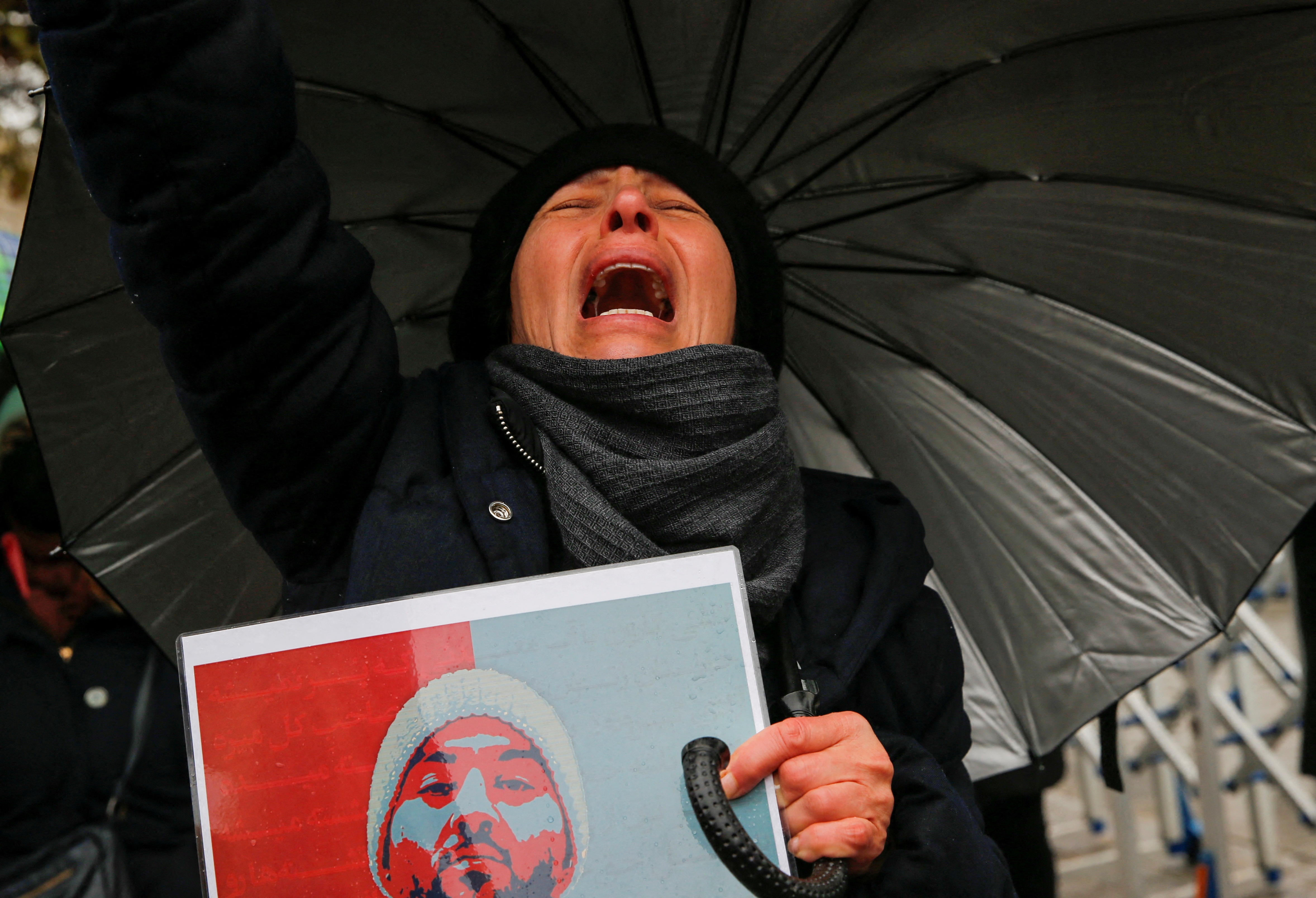 A woman attends a protest of members of the Iranian community living in Turkey in support of Iranian women, after the death of Mahsa Amini, in Istanbul