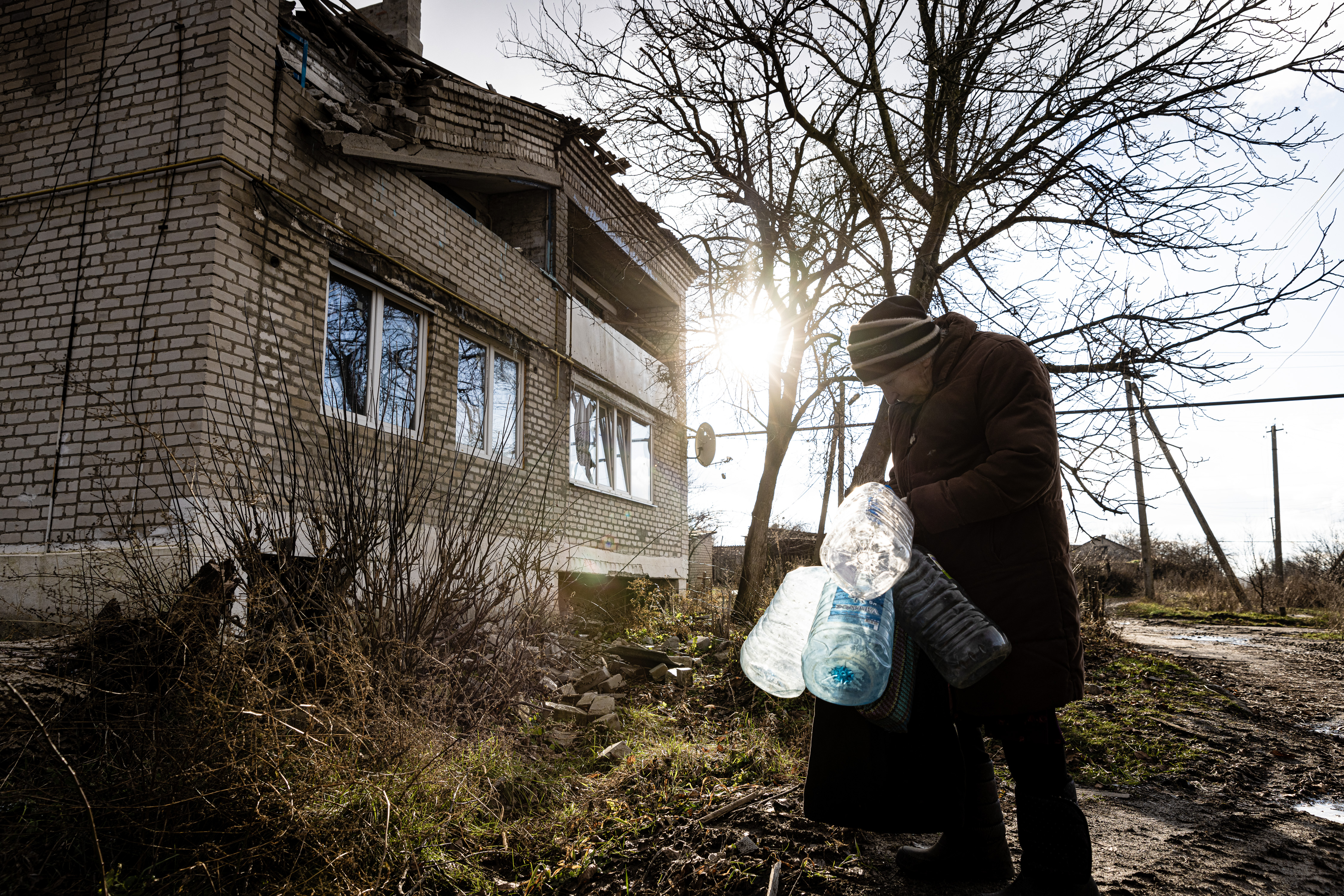 villager on her way to fetch water.
