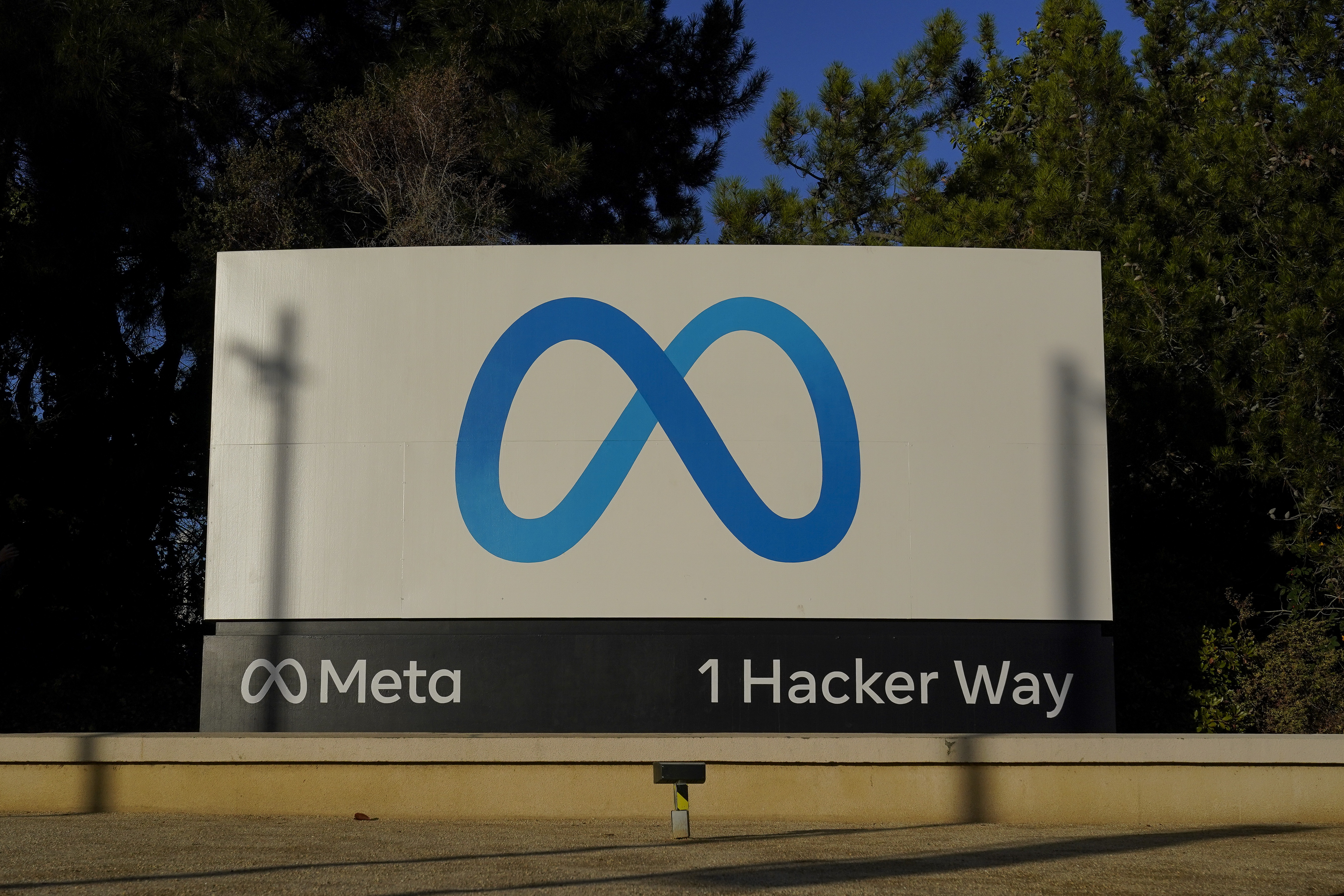 Meta's logo can be seen on a sign at the company's headquarters in Menlo Park, California.