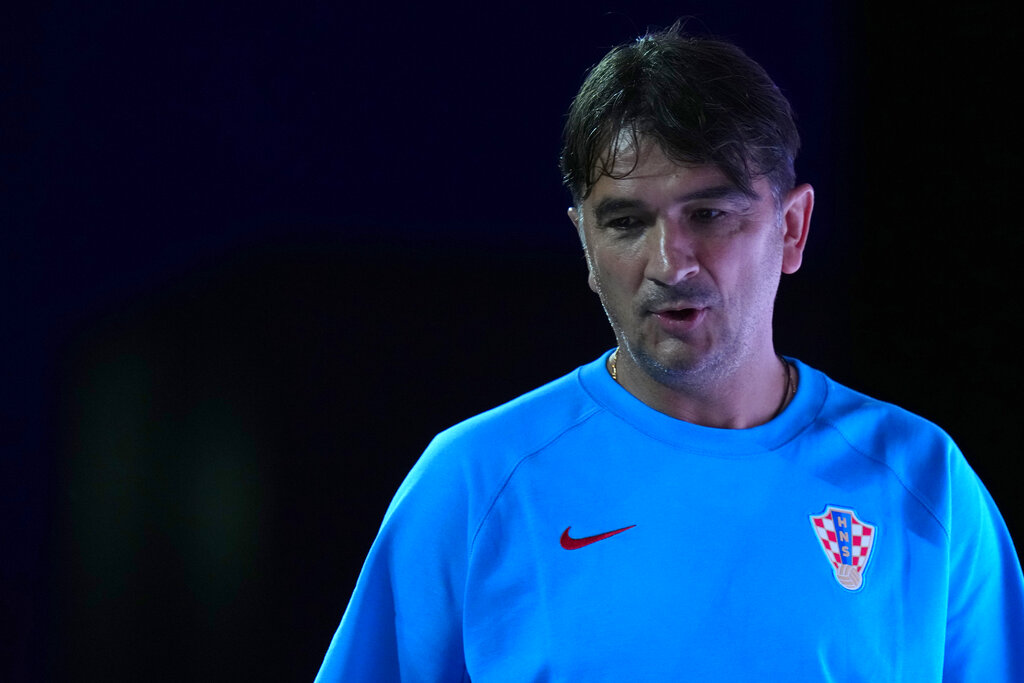 Croatia's head coach Zlatko Dalic arrives for a press conference on the eve of the 2022 World Cup semifinal.