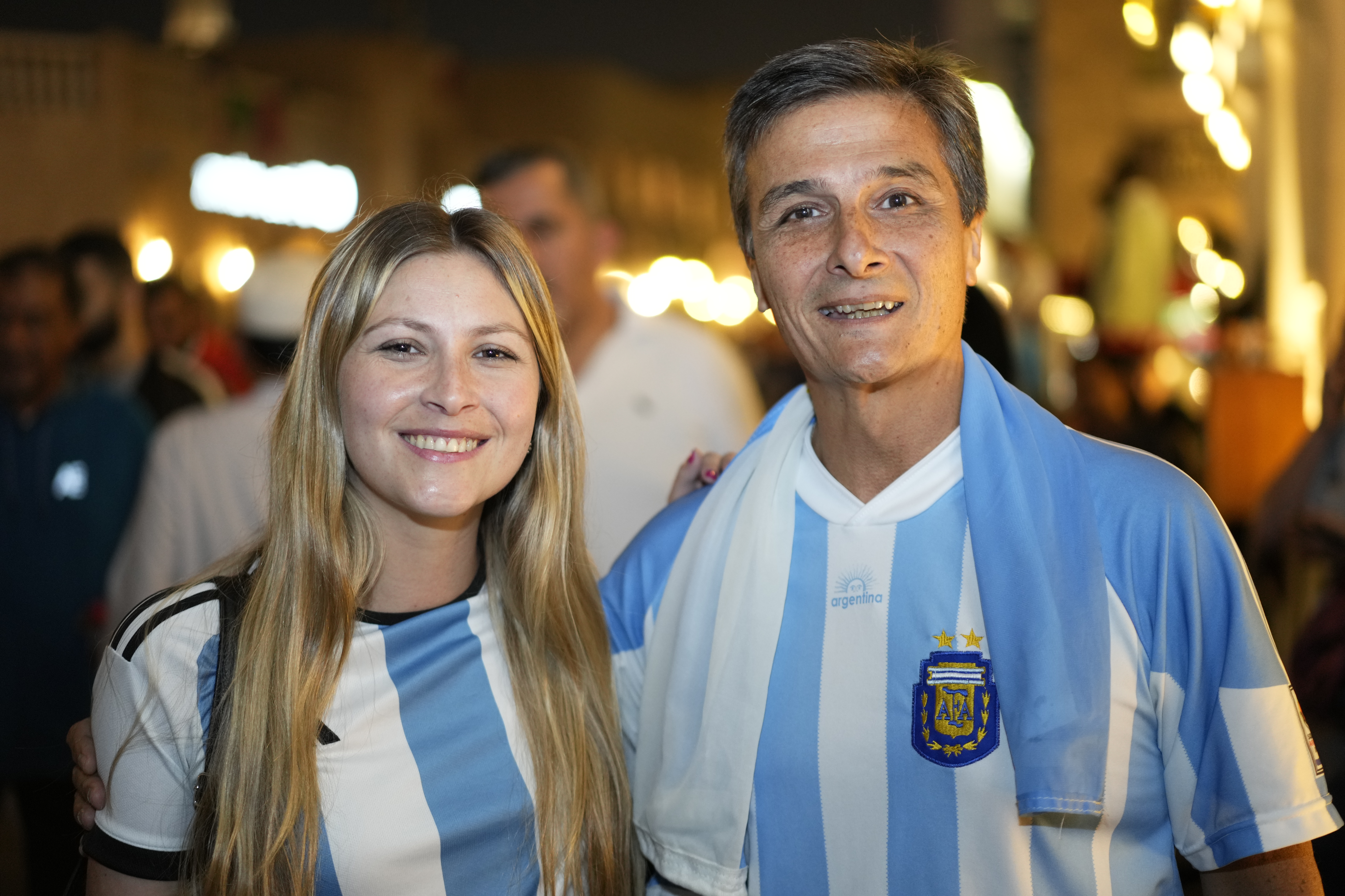 Flavian Costa with his daughter, Argentina fans. Fan gathering at Corniche in Doha during the FIFA World Cup