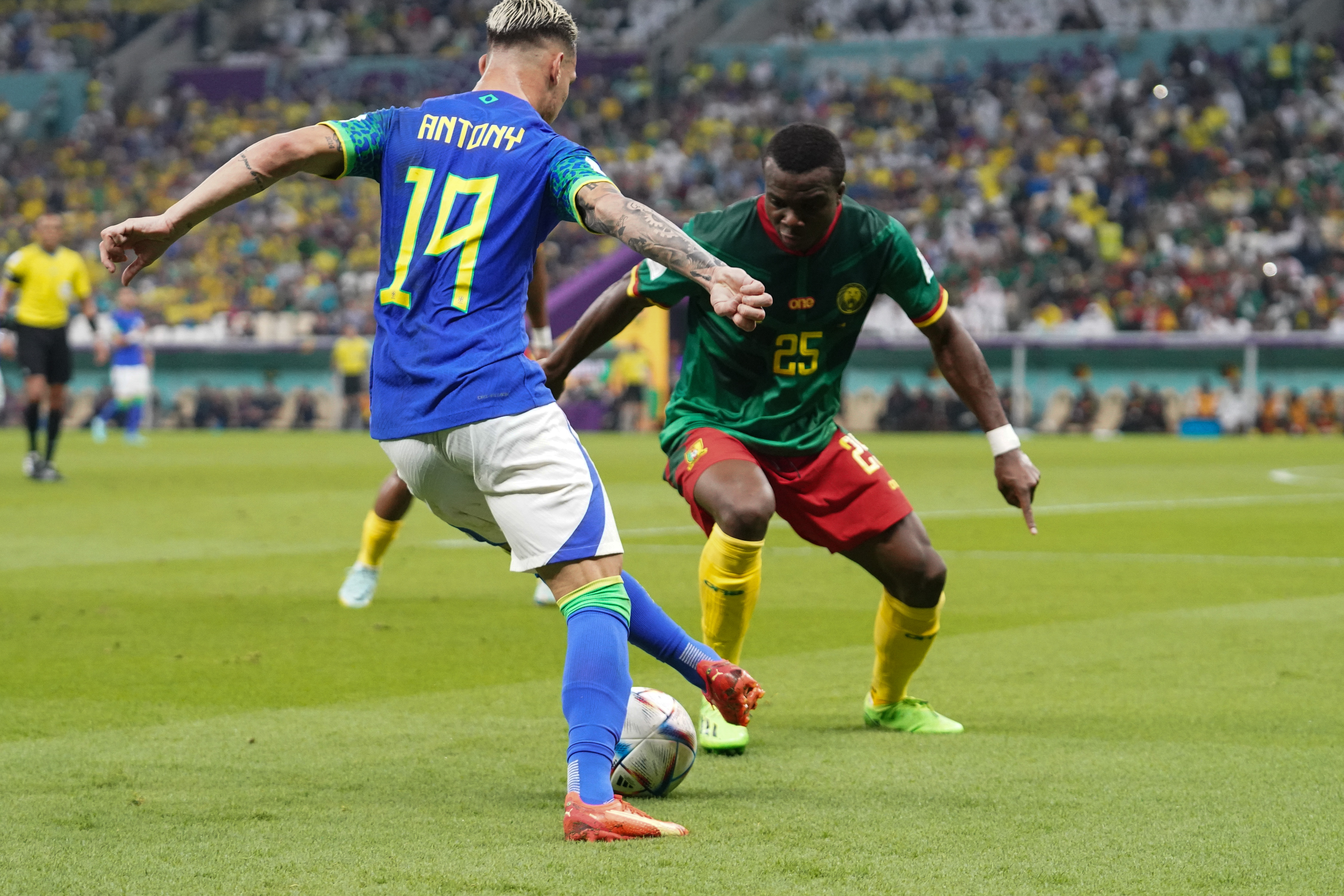 Antony Santos #19 in action with Nouhou Tolo #25