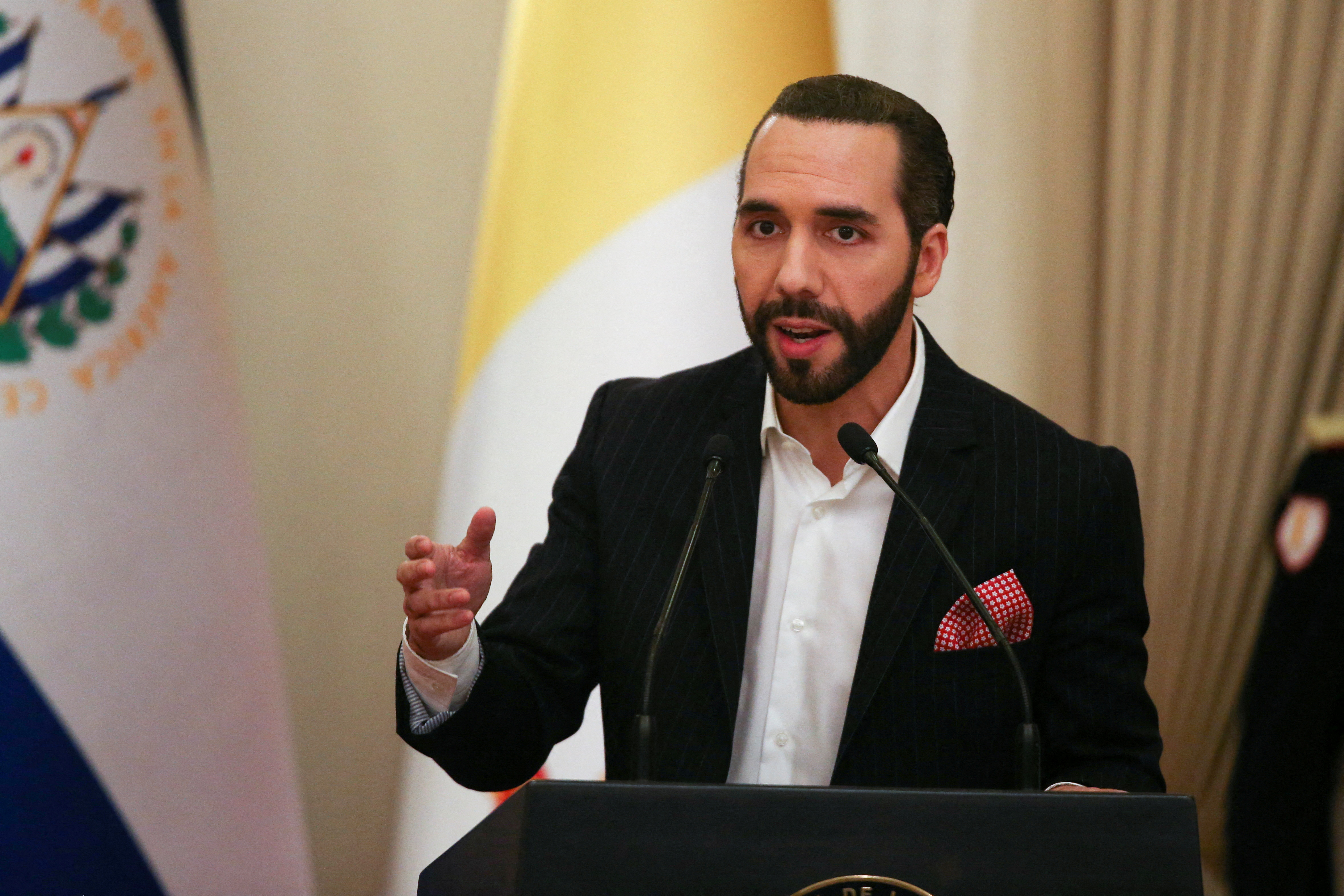 FILE PHOTO: El Salvador's President Nayib Bukele speaks during a decoration ceremony to the Apostolic Nuncio to El Salvador Santo Gandemi, in San Salvador, El Salvador
