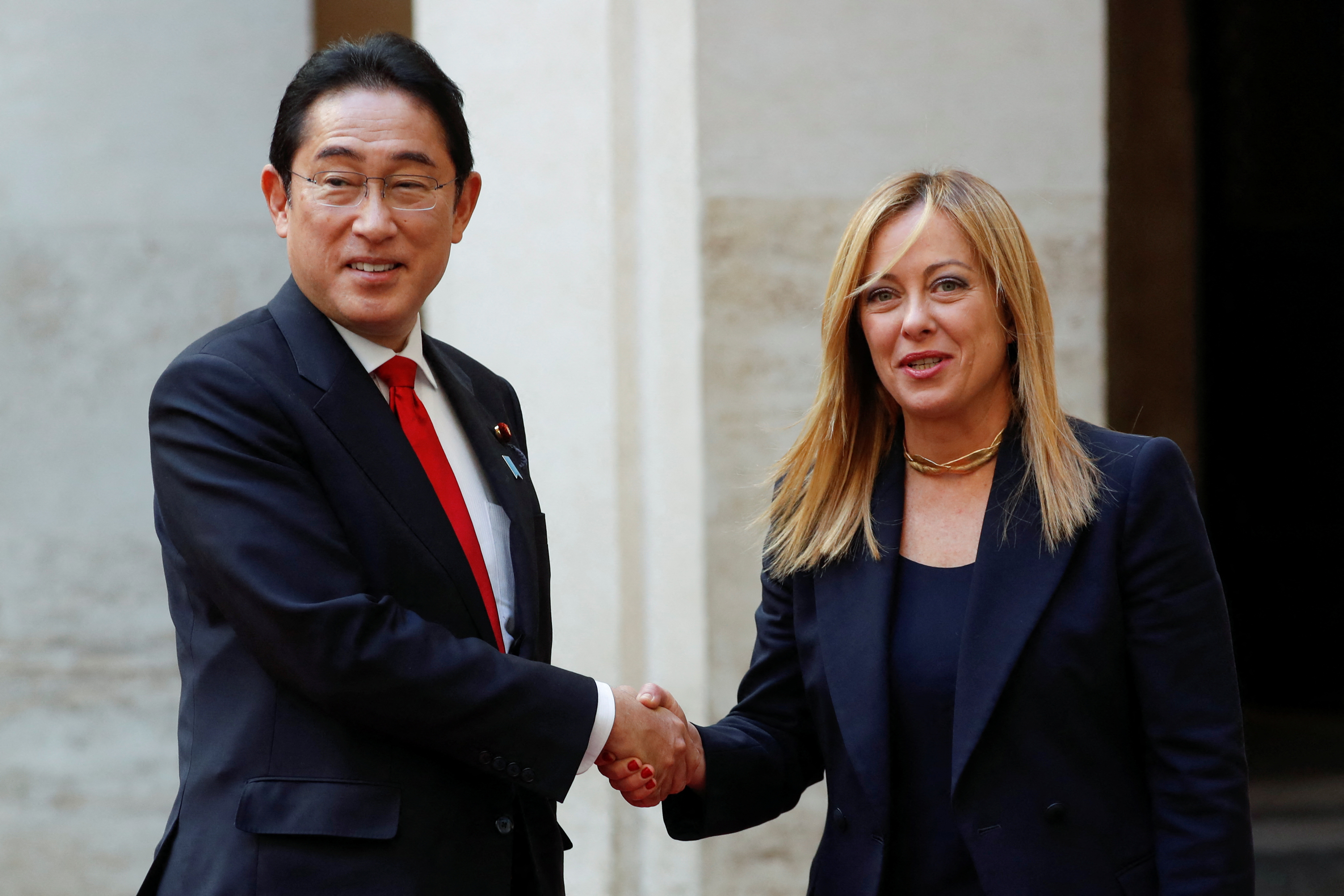 Italian Prime Minister Giorgia Meloni welcomes Japanese Prime Minister Fumio Kishida at Chigi Palace, in Rome