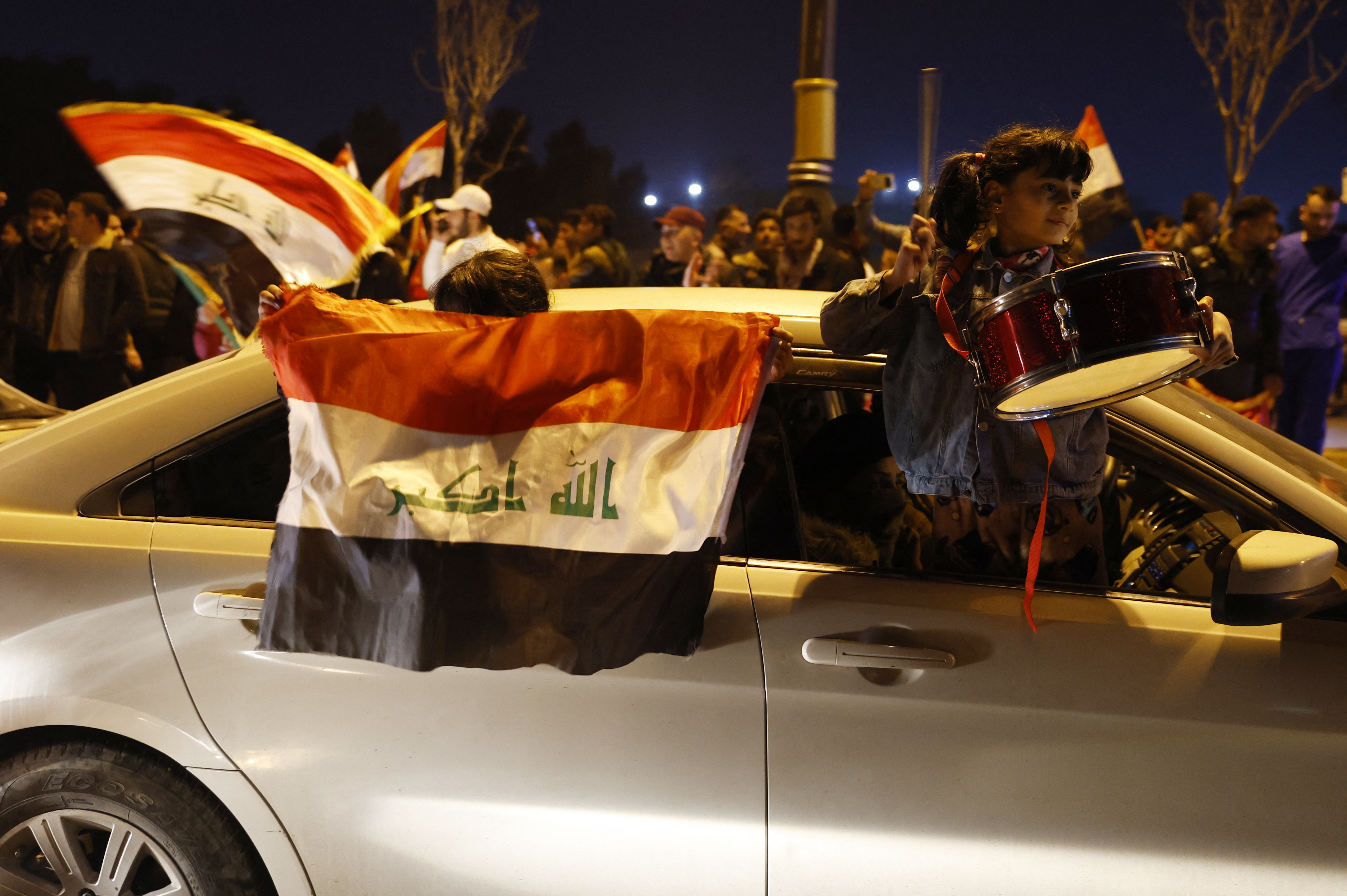 raq fans celebrate after winning the Arabian Gulf Cup25 Final REUTERS/Khalid Al-Mousily