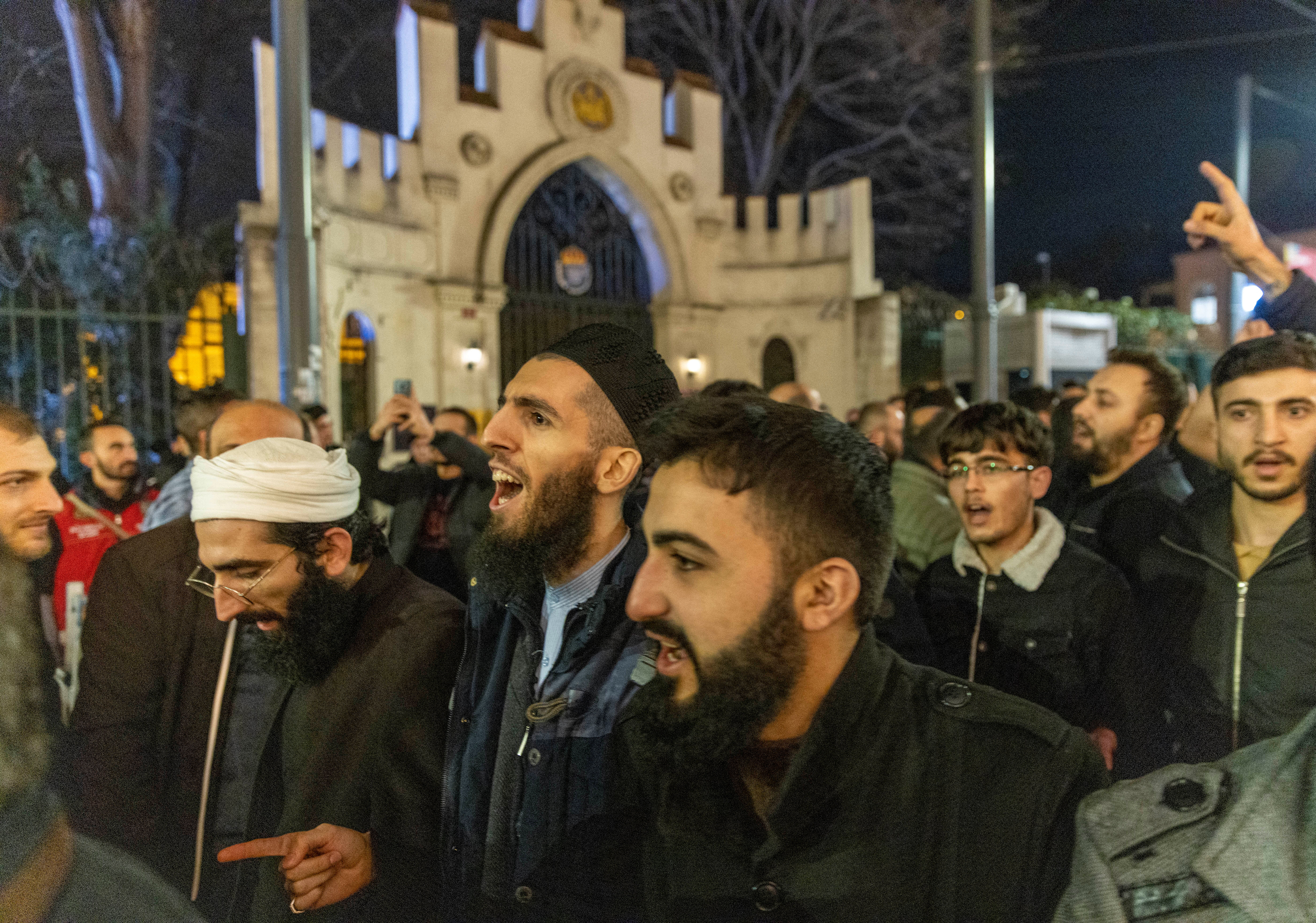 Protesters demonstrate outside the Consulate General of Sweden after Rasmus Paludan, leader of the Danish far-right political party Hard Line, who has Swedish citizenship, burned a copy of the Koran near the Turkish embassy in Stockholm, in Istanbul, Turkey, January 22, 2023. REUTERS/Umit Bektas