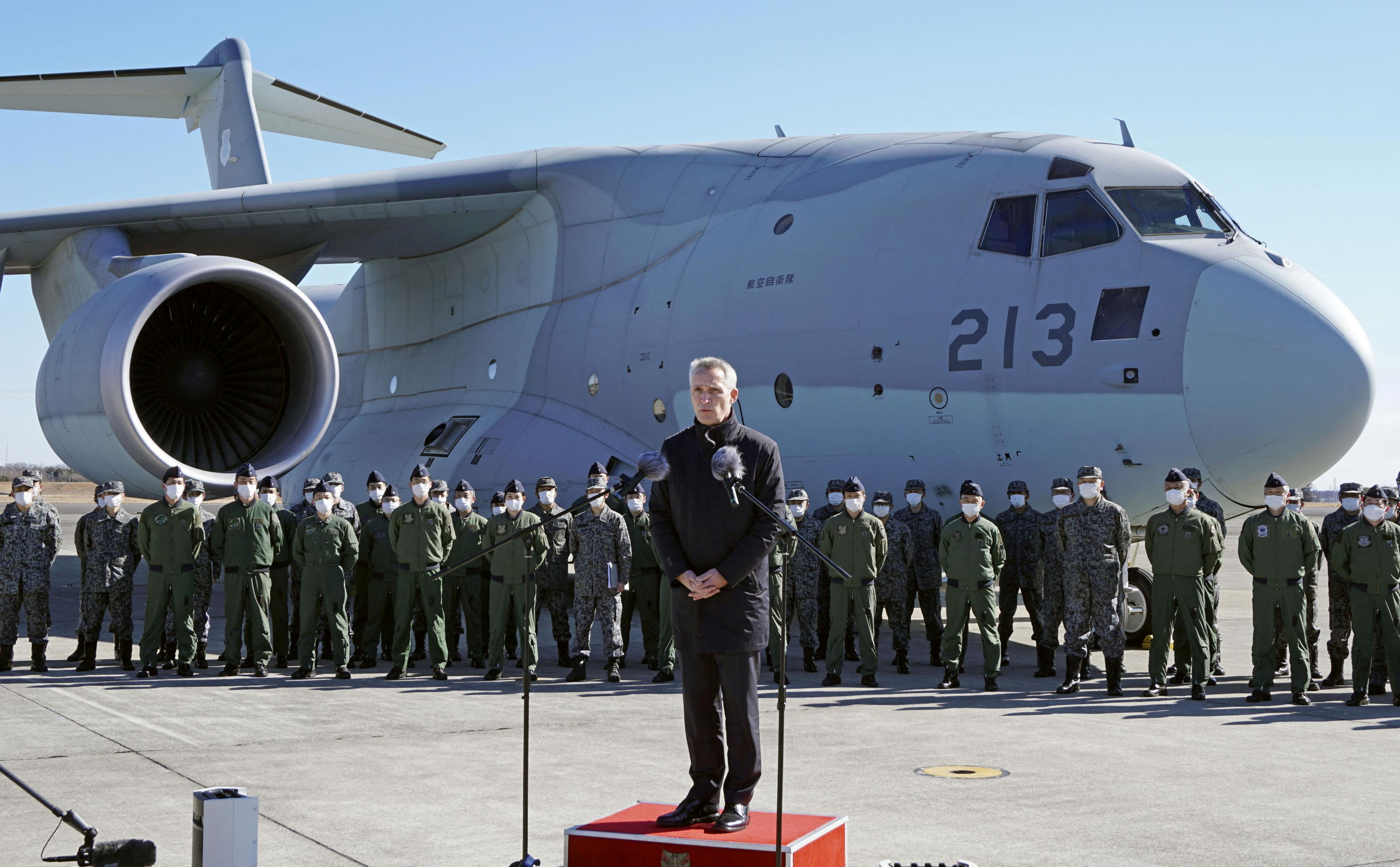 NATO Secretary General Jens Stoltenberg delivers a speech as he visits Japan Air Self-Defence Force's Iruma base in Sayama, north of Tokyo, Japan January 31, 2023