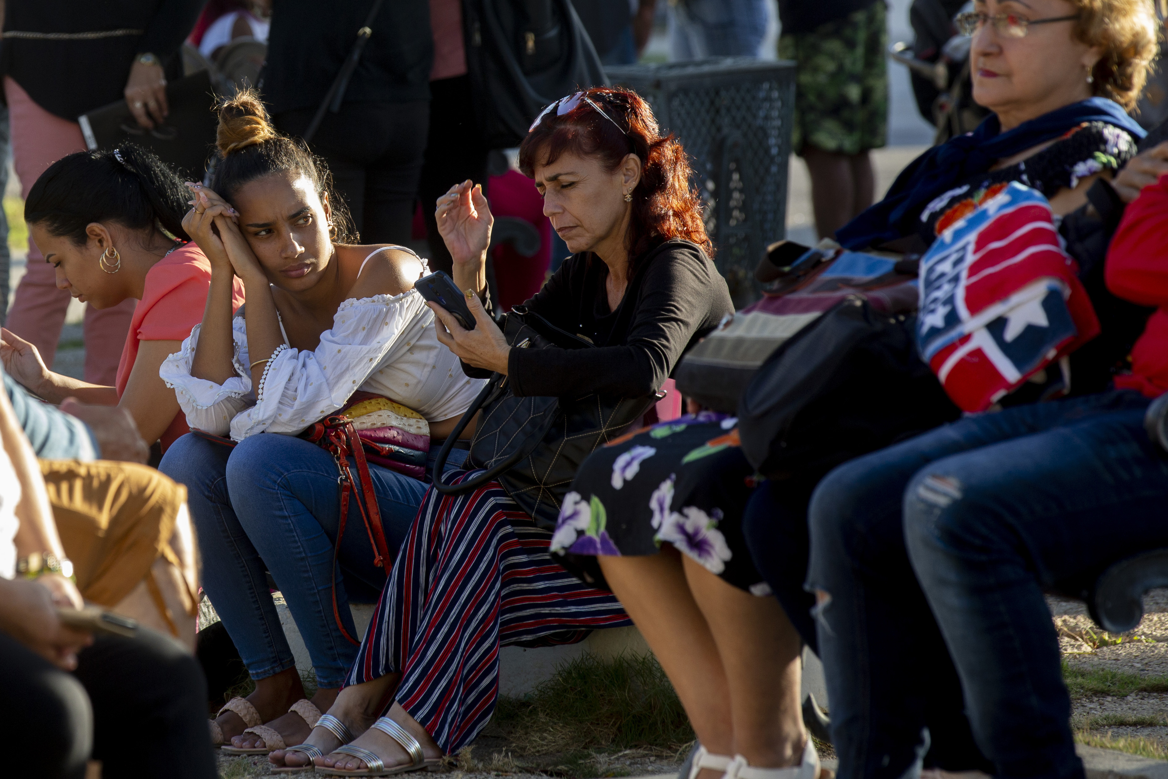People wait in line for US embassy services