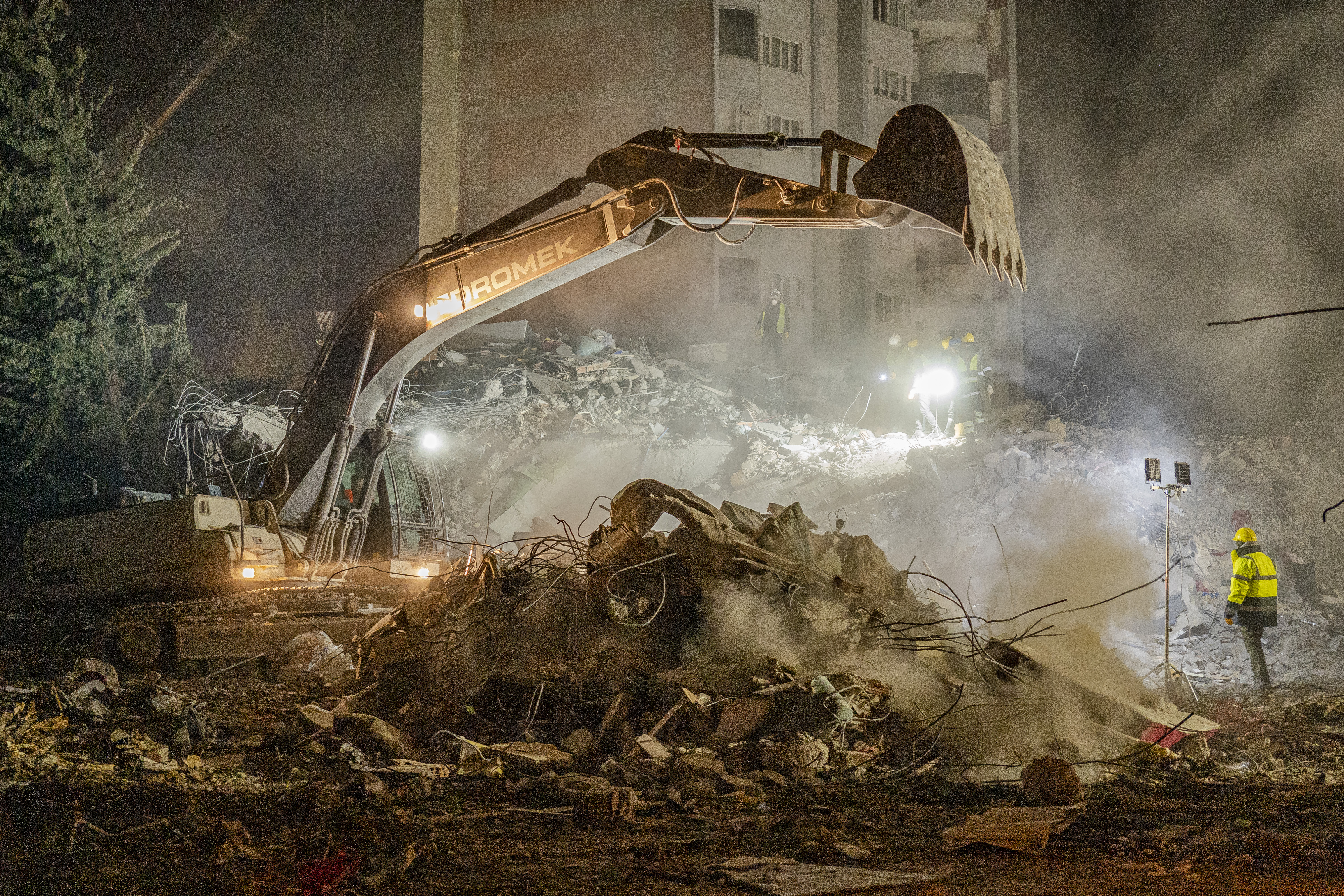 A crane excavates amid the rubbles, a sign that search teams believe there might no longer be survivors beneath the pile of debris. 