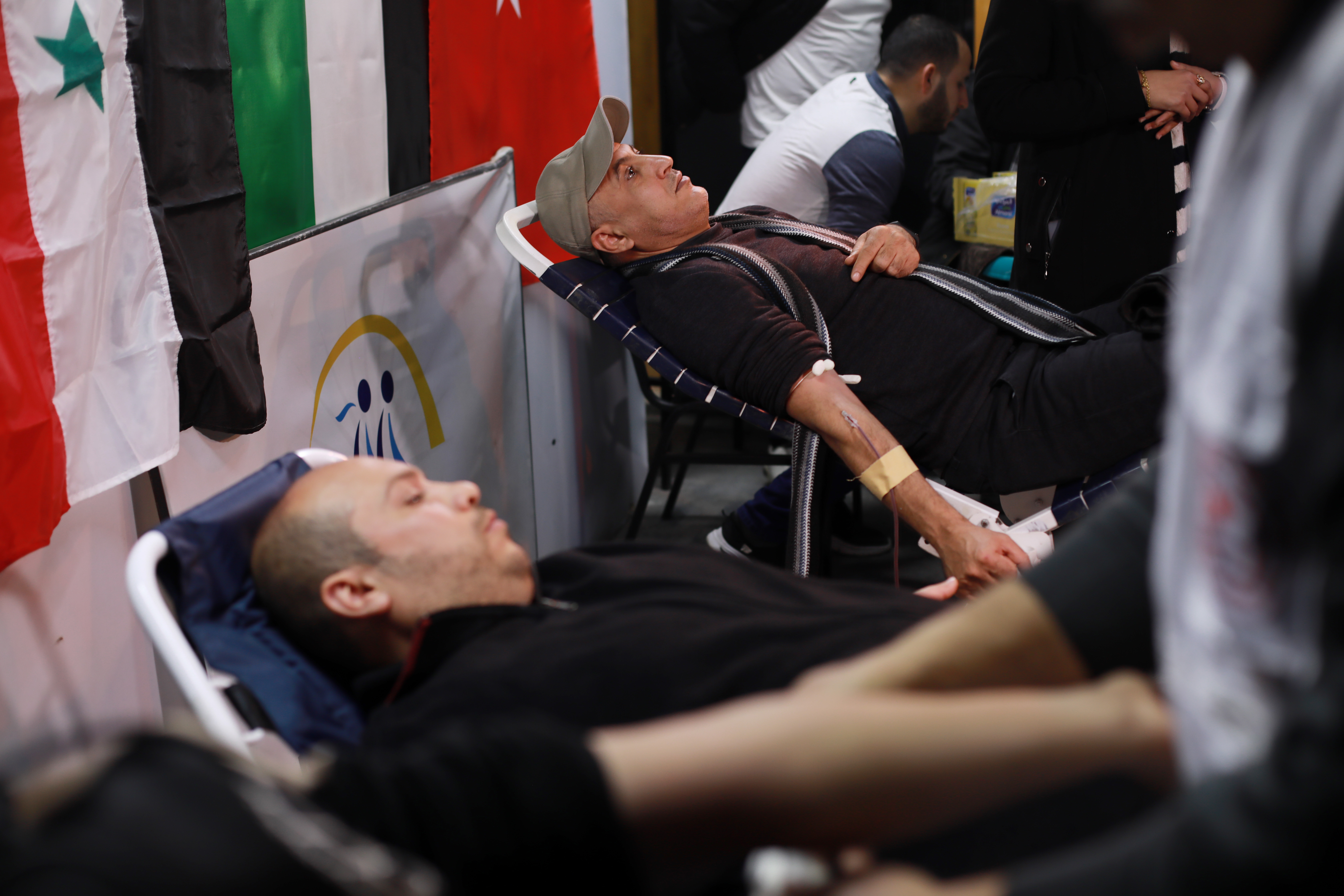 People donating blood