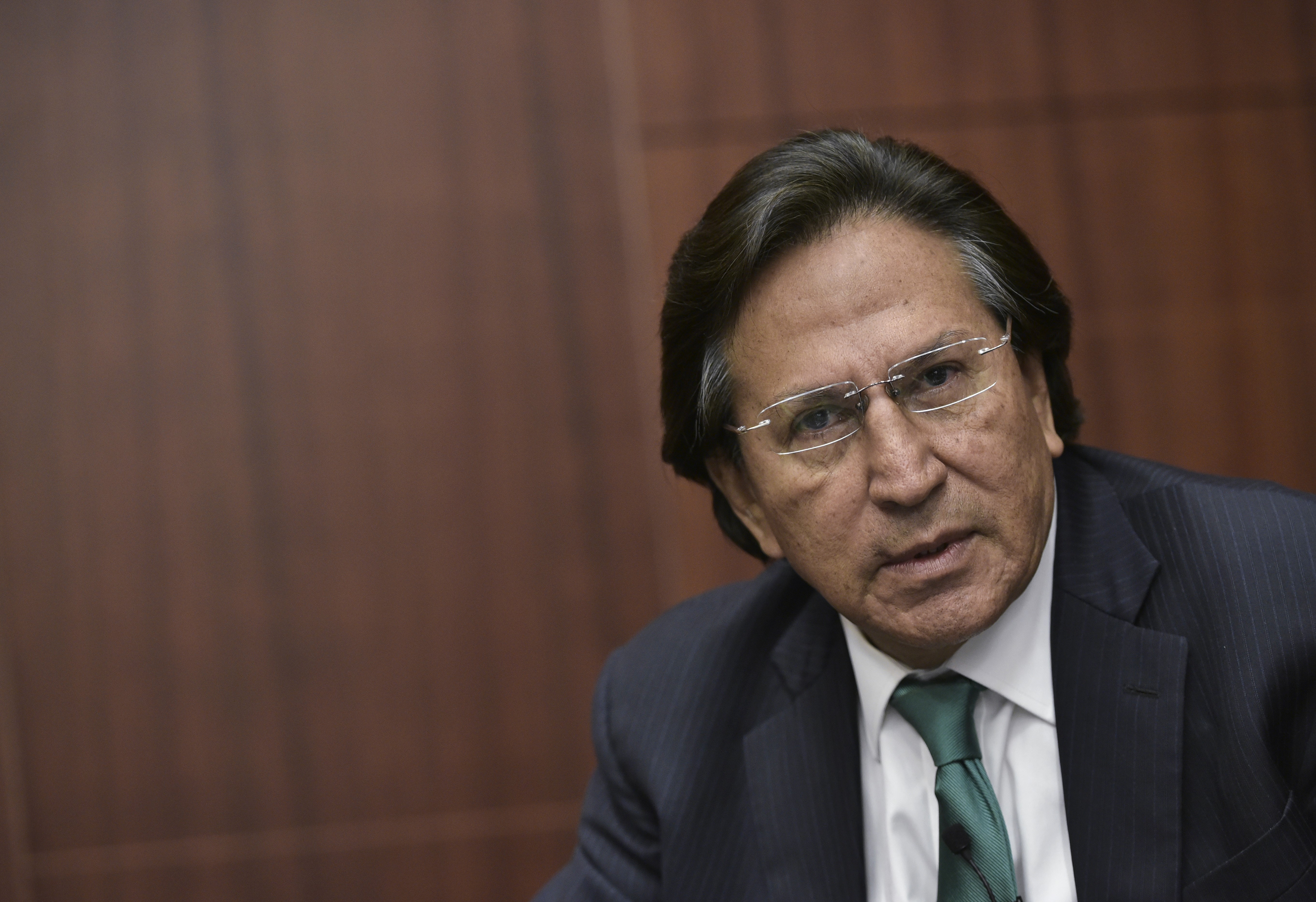 (FILES) In this file photo taken on June 17, 2016, former President of Peru Alejandro Toledo speaks during a discussion on Venezuela and the OAS at The Center for Strategic and International Studies (CSIS) in Washington, DC. - The United States has authorized the extradition of former Peruvian president Alejandro Toledo, who served from 2001 to 2006, to face charges of corruption in his home country, Peru's prosecutor's office said February 21, 2023. "We have been informed that the US State Department authorized the extradition of Alejandro Toledo Manrique for the crimes of collusion and money laundering," the prosecutor's office said on Twitter. (Photo by Mandel Ngan / AFP)