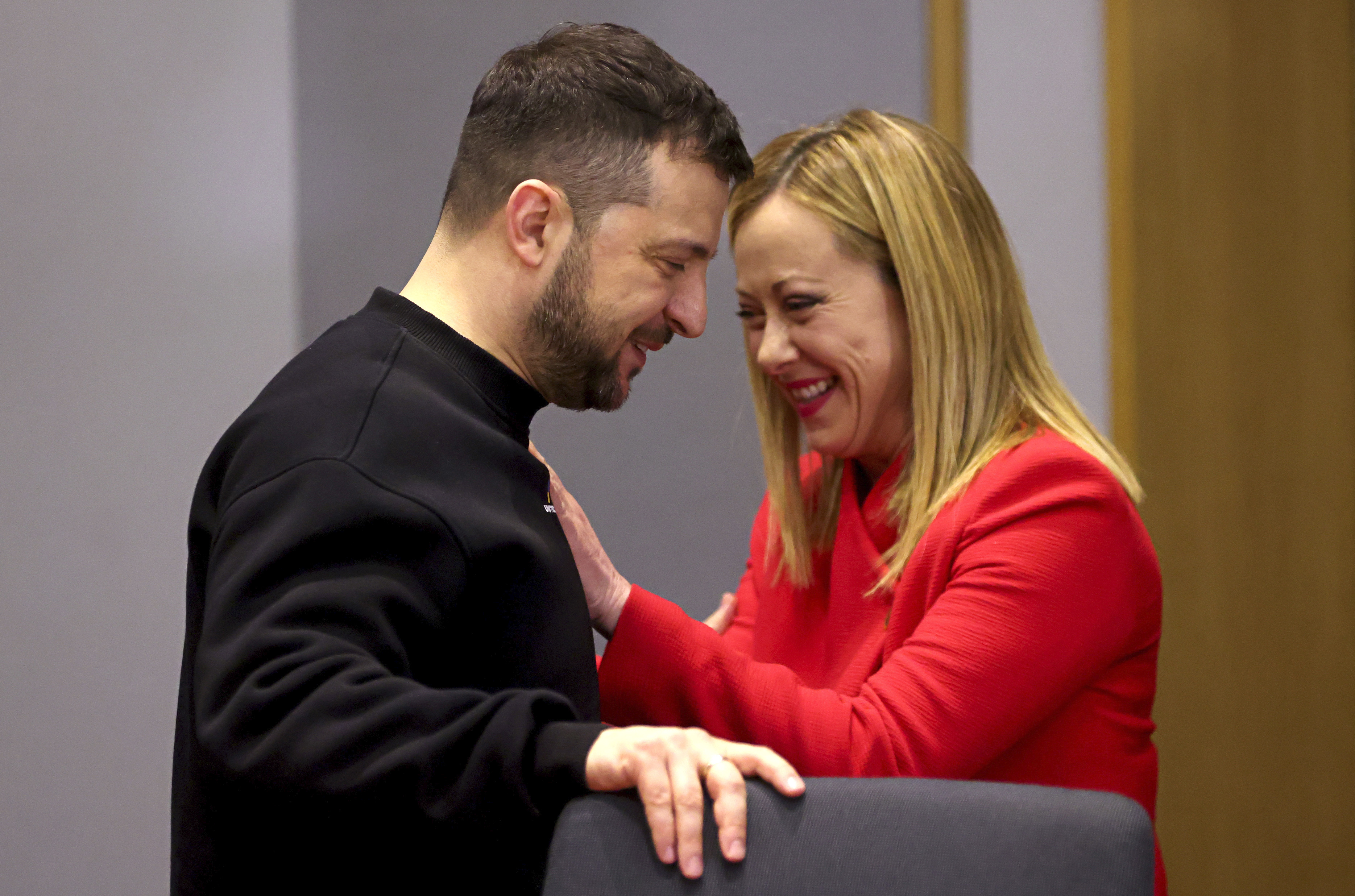 Ukraine's President Volodymyr Zelenskyy, left, speaks with Italy's Prime Minister Giorgia Meloni during a bilateral meeting at an EU summit in Brussels
