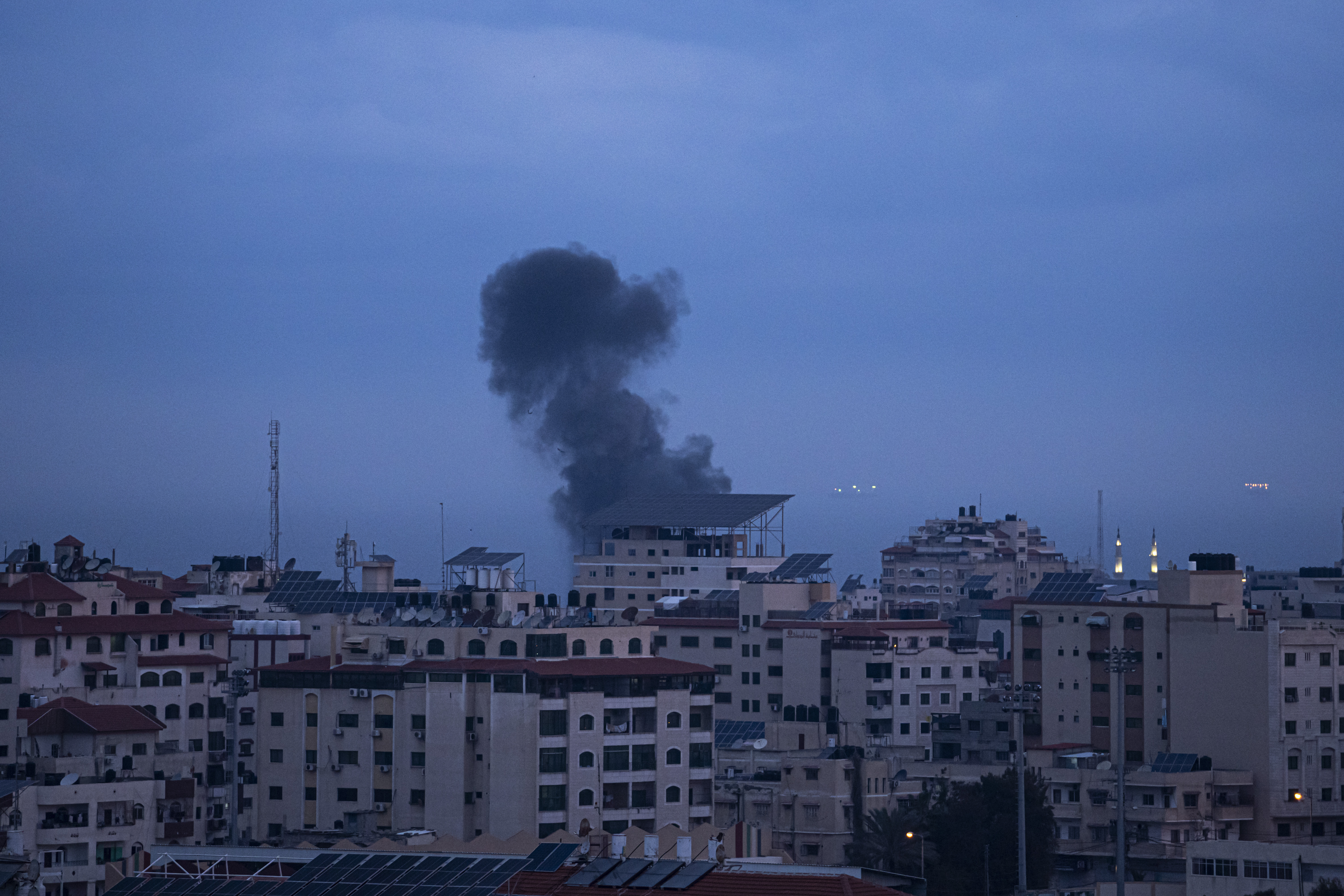 Smoke rises following an Israeli airstrike in the western Gaza Strip, Thursday