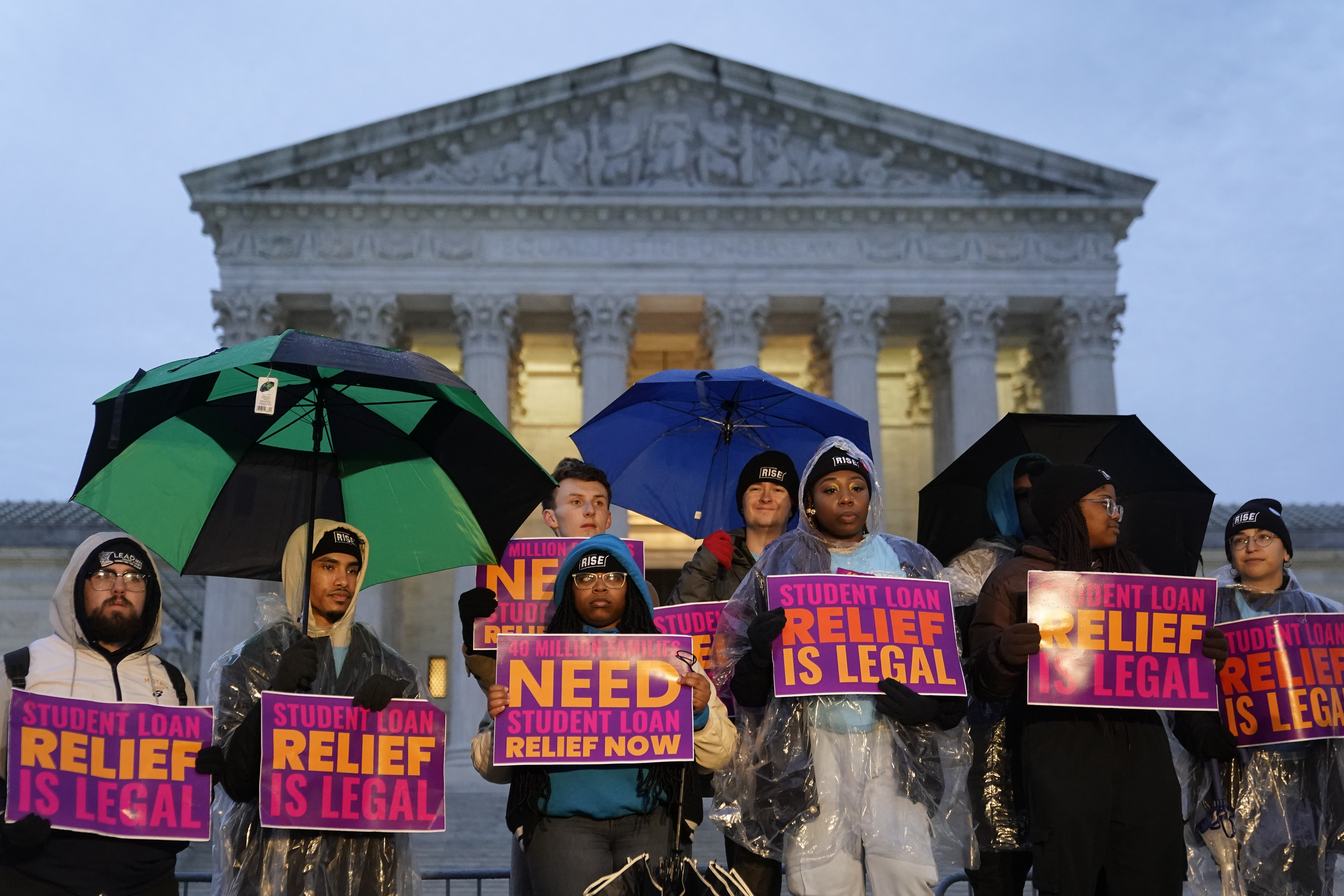 Student debt relief advocates gather outside the Supreme Court on Capitol Hill in Washington